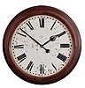 Seth Thomas Clock Co., Thomaston, Conn., "Gallery, 24 inch" wall hanging clock with a spring driven 15 day double wind timepiece movement in a walnut case.