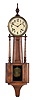 E. Ingraham & Co., Bristol, Conn., "Nile" banjo clock with a spring driven, 8 day, time and strike movement in a rubbed mahogany finish case