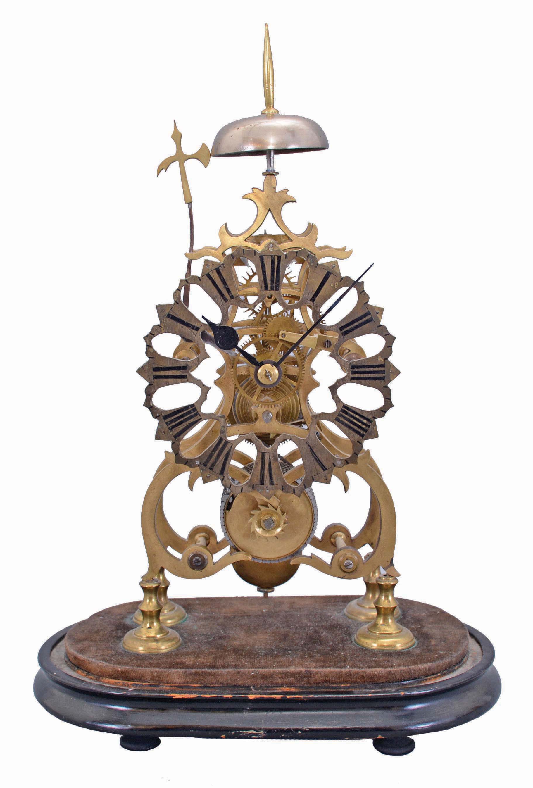 England, late 19th Century, passing strike skeleton clock, in a fretted brass scroll frame, no dome. — Antique Clocks Price Guide