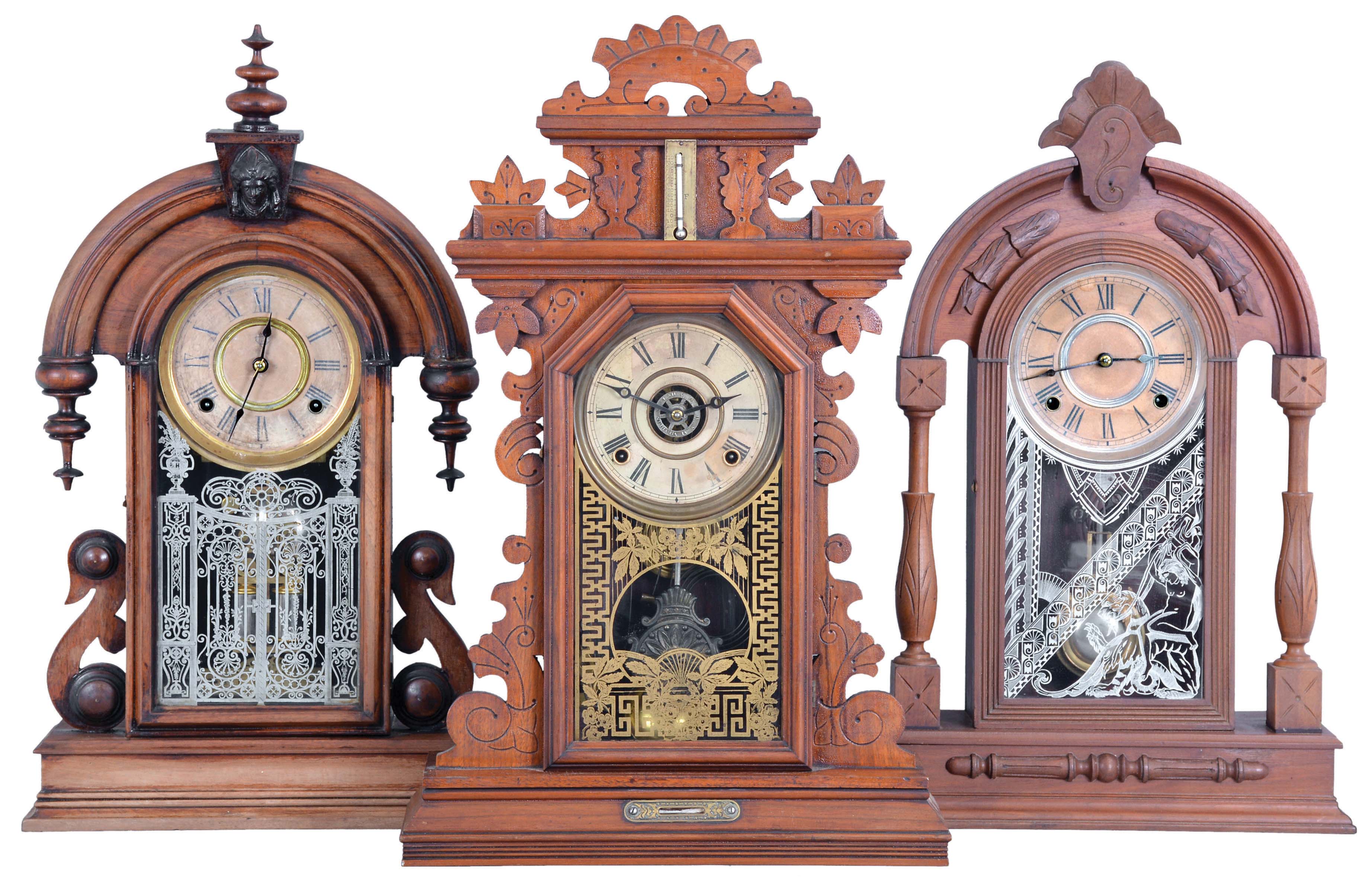 Clocks- 3 (Three): (1) Ansonia Clock Co., New York, "Parisian" shelf clock with a spring driven, 8 day, time and strike movement in a walnut case, c1880; (2) William L. Gilbert Clock Co., Winsted, Conn., "Texas" shelf clock with a spring driven, 8 day, time and strike movement in a walnut case, c1881. (3) E. Ingraham &amp; Co., Bristol, Conn., premium model shelf clock with a spring driven, 8 day time, strike &amp; alarm movement in a walnut case with a thermometer &amp; level, c1880. — Antique Clocks Price Guide