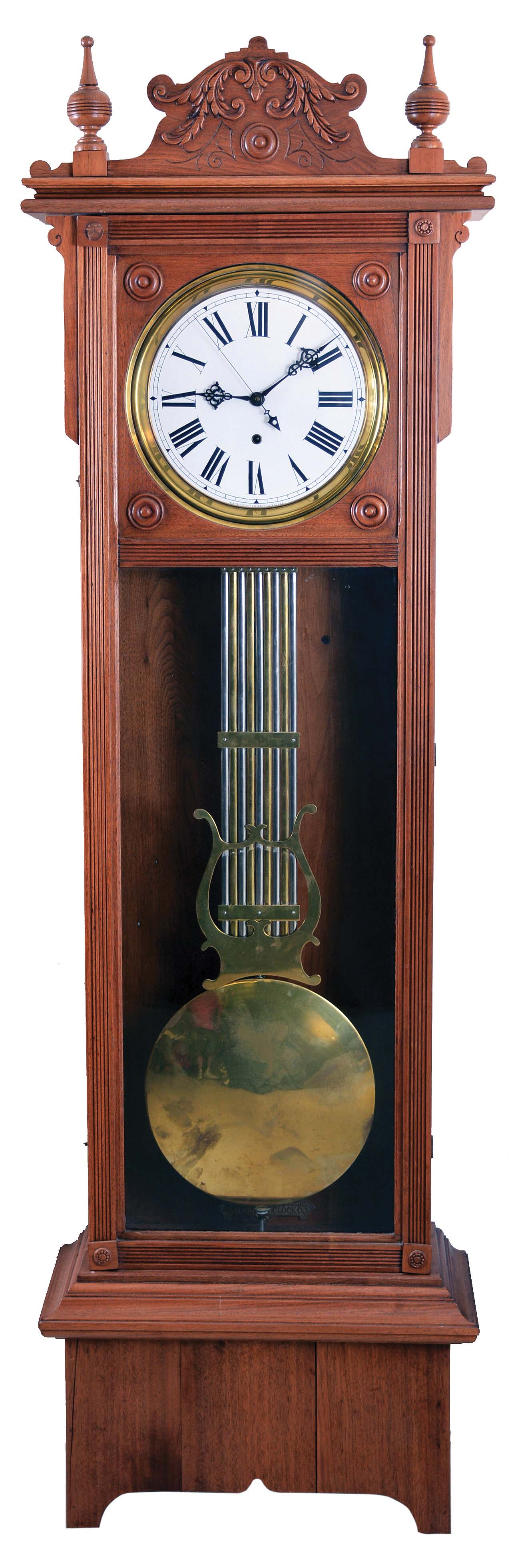 Waterbury Clock Co., Waterbury, Conn., "Regulator No. 60 or 61", jeweler's regulator floor standing clock, 8 day, time only, brass weight driven movement with Graham deadbeat escapement, gridiron lyre pendulum and sweep seconds in an walnut case with a, white enamel dial — Antique Clocks Price Guide