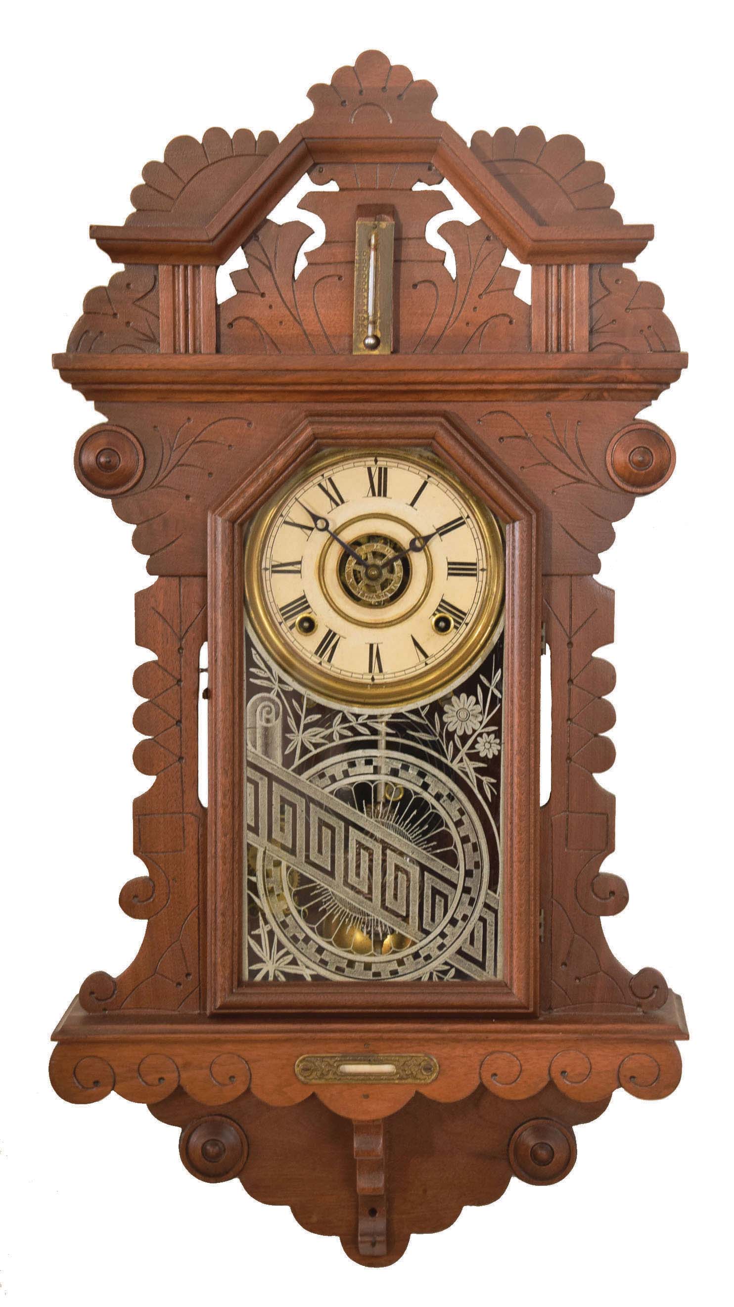 E. Ingraham &amp; Co., Bristol, Conn., "? Drop", 8 day, time, strike and alarm spring brass movement wall clock. This premium model clock looks to be a variation on the "Amulet" mantel clock. There is a partial label that states this clock is manufactured exclusively for a company, but the name is difficult to read. — Antique Clocks Price Guide