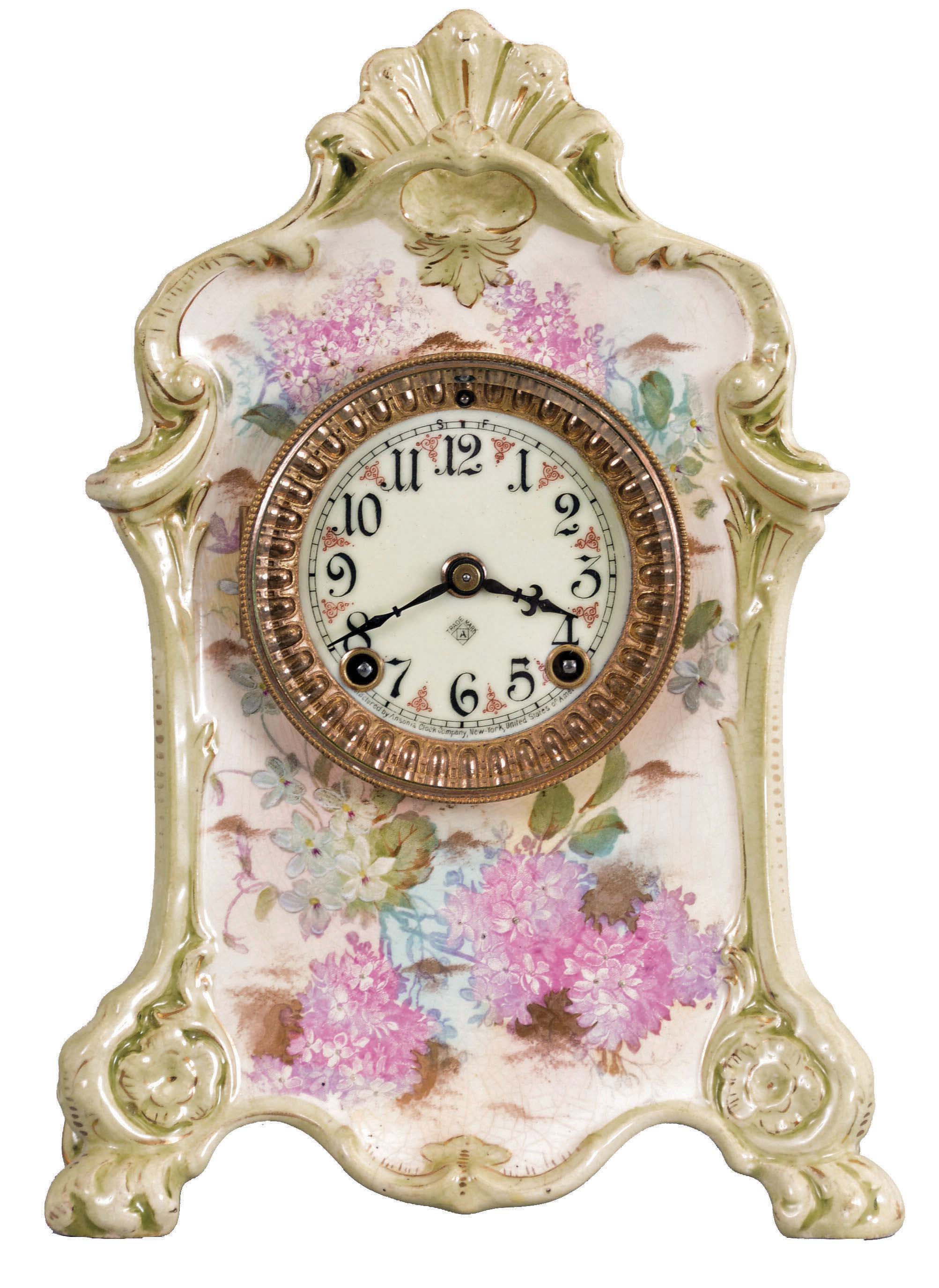 Ansonia Clock Co., New York, "La Farge" porcelain shelf clock with a spring driven, 8 day time and half hour gong strike movement in a Royal Bonn porcelain case. — Antique Clocks Price Guide