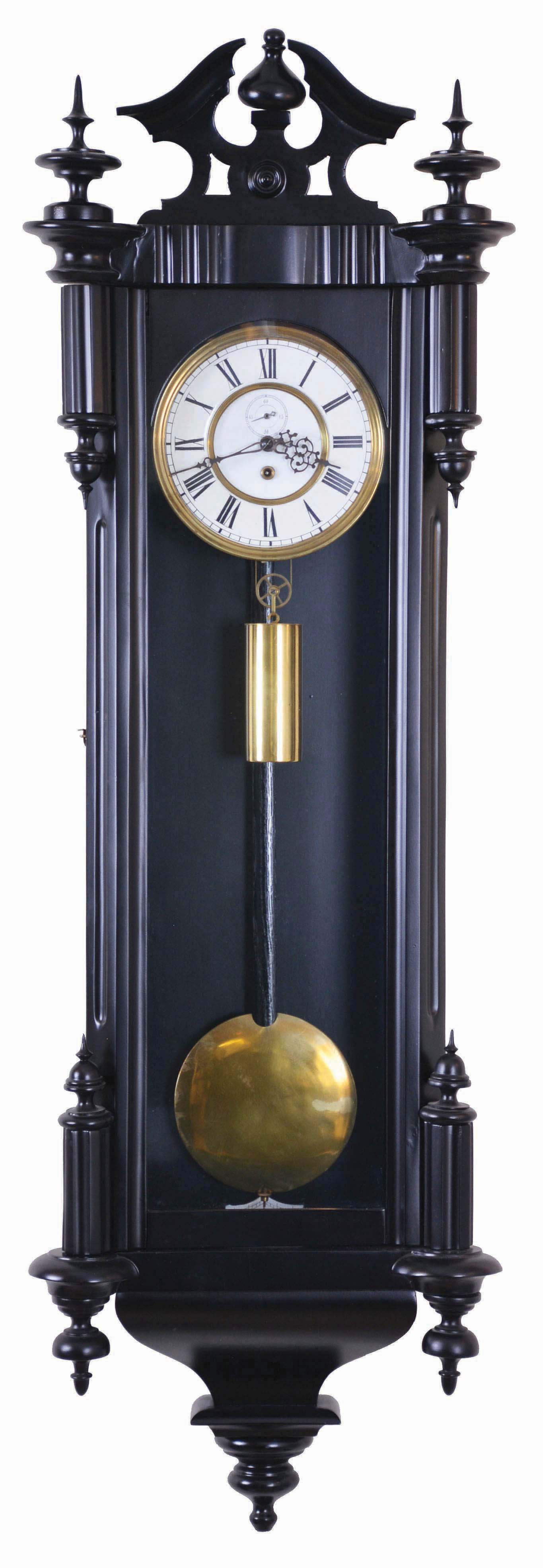 F. Kroeber Clock Co., New York, "Vienna Regulator No. 47", weight driven movement in an ebonized wall case, porcelain dial, fretted minute and hour hand, and a seconds hand below 12. — Antique Clocks Price Guide