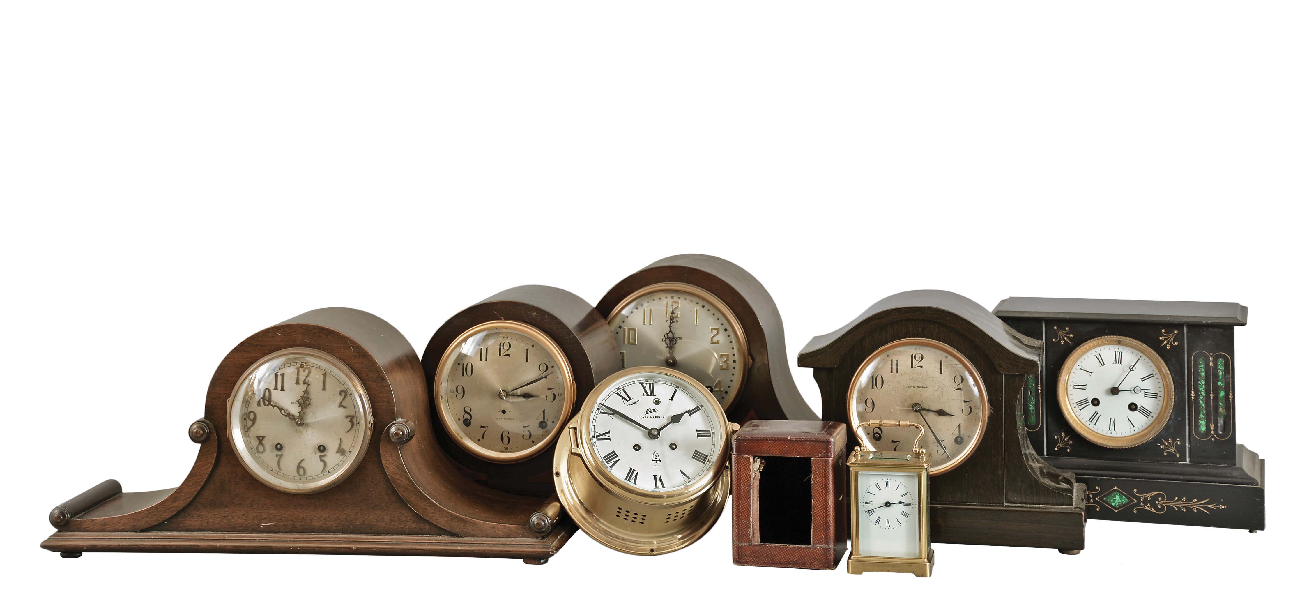 Clocks- 7 (Seven) spring driven: Four time and strike wood case tambour clocks by Seth Thomas and Sessions, one black mantel clock with slate case and Japy Freres movement, Schatz "Royal Mariner" ship's clock, and a time-only carriage clock from France. — Antique Clocks Price Guide