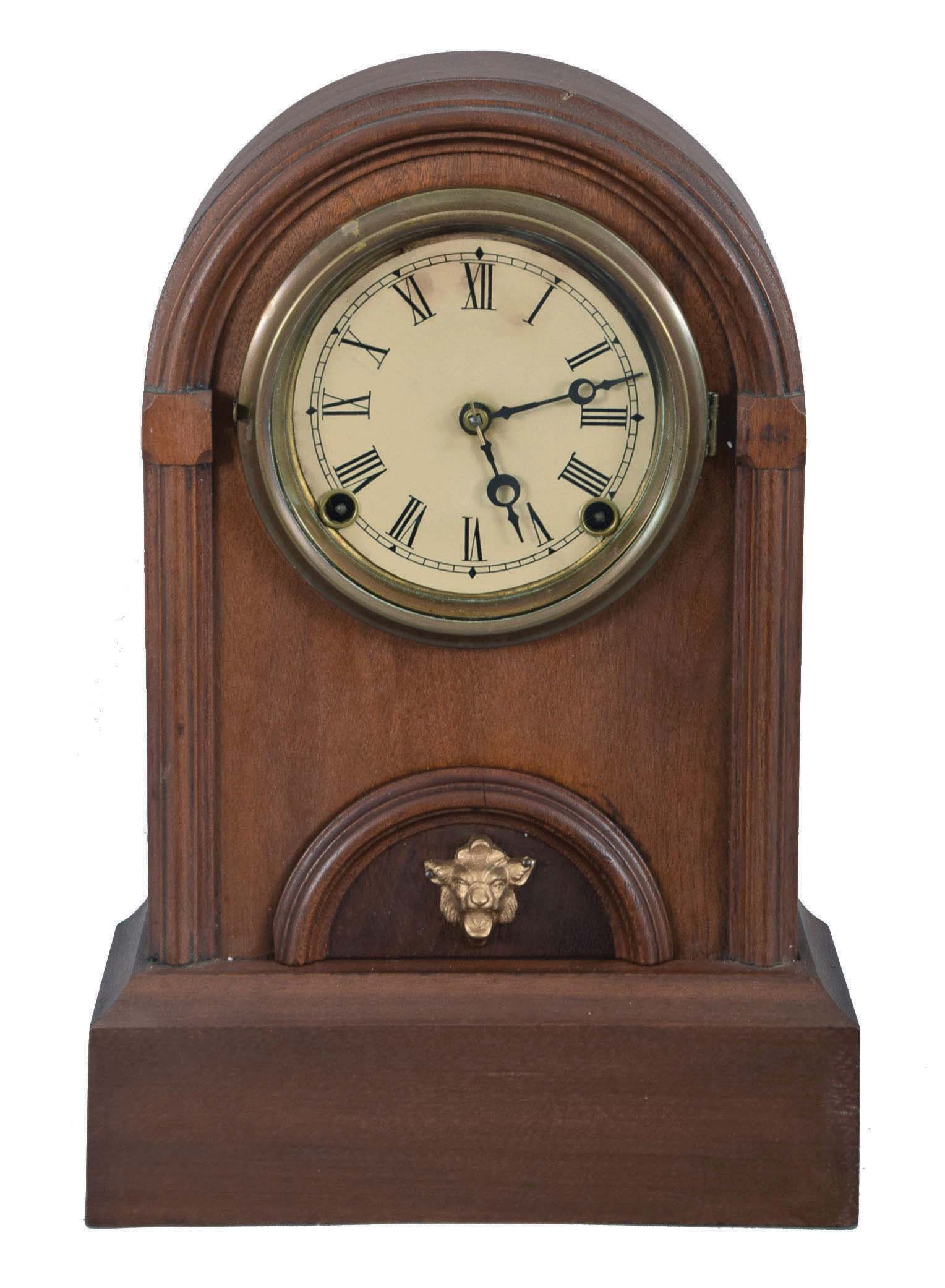 Clocks- 3 (Three): (1) F. Kroeber Clock Co., New York, "Round Top" shelf clock with a spring driven, 8 day, time and strike movement in a walnut case, c1875; (2) F. Kroeber Clock Co., New York, "Round Top Extra" shelf clock with a spring driven, 8 day, time and strike movement in a walnut case with a burl walnut base, c1872. (3) F. Kroeber Clock Co., New York, "Round Top with Alarm" shelf clock, 30 hour, time and strike with alarm, spring driven movement in a walnut case, c1872. — Antique Clocks Price Guide