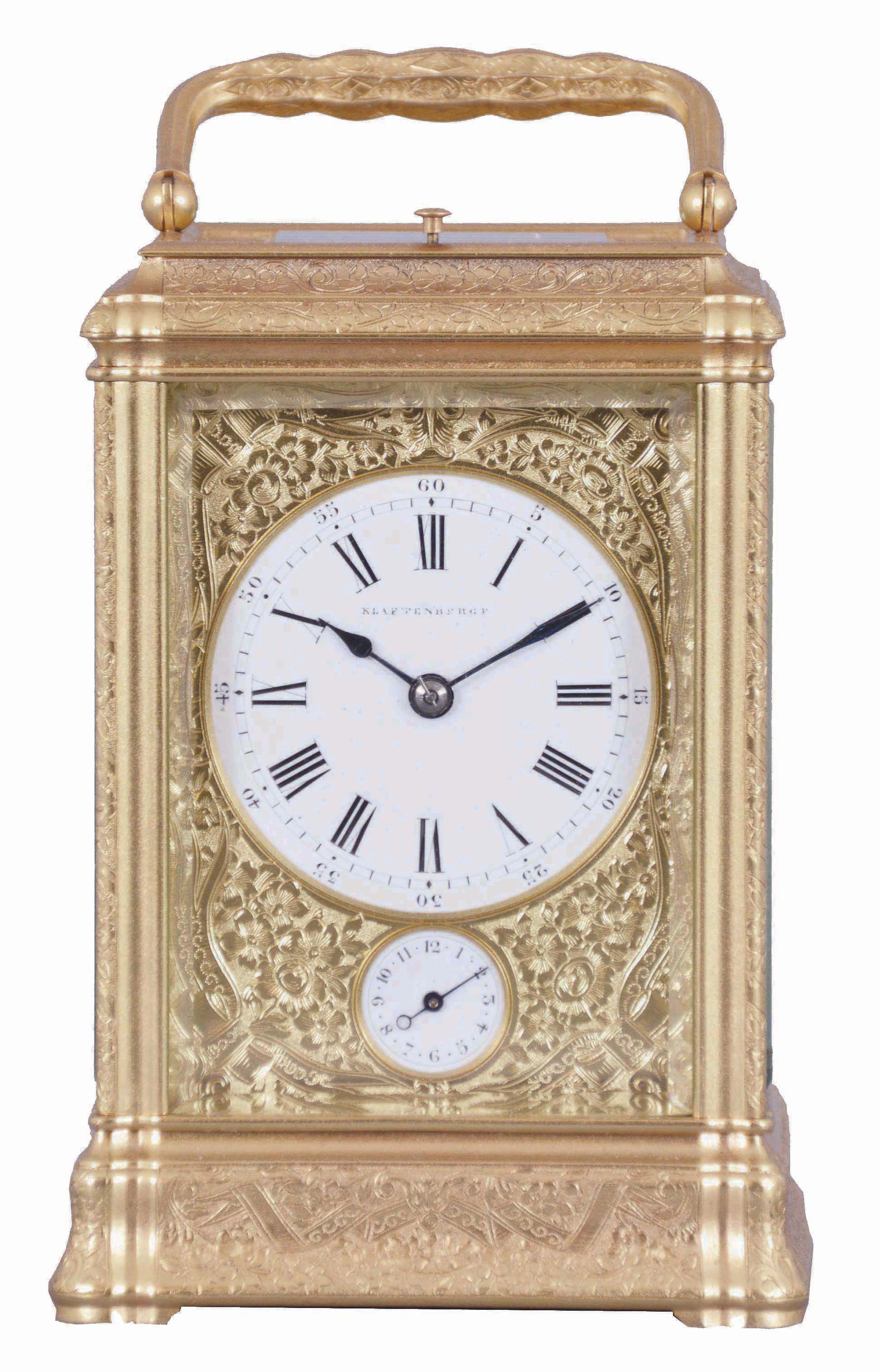 Klaftenberger, Paris, a fine, gorge cased, grand sonnerie carriage clock, the glazed, gilt case with foliate engraving and chasing, Roman numeral white enamel dial with blued steel hands, and with gilt mask, engraved to match the case, 8 day time, strike, and alarm movement with lever platform, sounding grand or petit quarters, and repeating the last hour and quarter on demand, with script "AB" stamp inside plates, and also with the mark of Henri Jacot. — Antique Clocks Price Guide