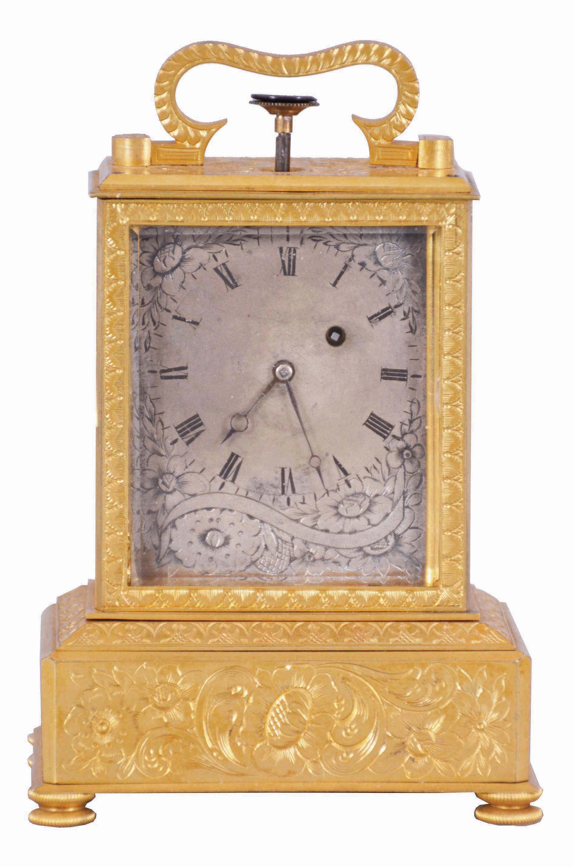 Adolph Uligh, Vienna, quarter repeating miniature carriage clock, rectilinear, gilt brass case on turned feet, the front and sides with foliate engraving, Roman numeral silvered dial, also engraved with floral decoration, blued steel Breguet style hands, round, 30 hour verge fusee movement with blued steel gongs, repeating the last hour and quarter on demand — Antique Clocks Price Guide