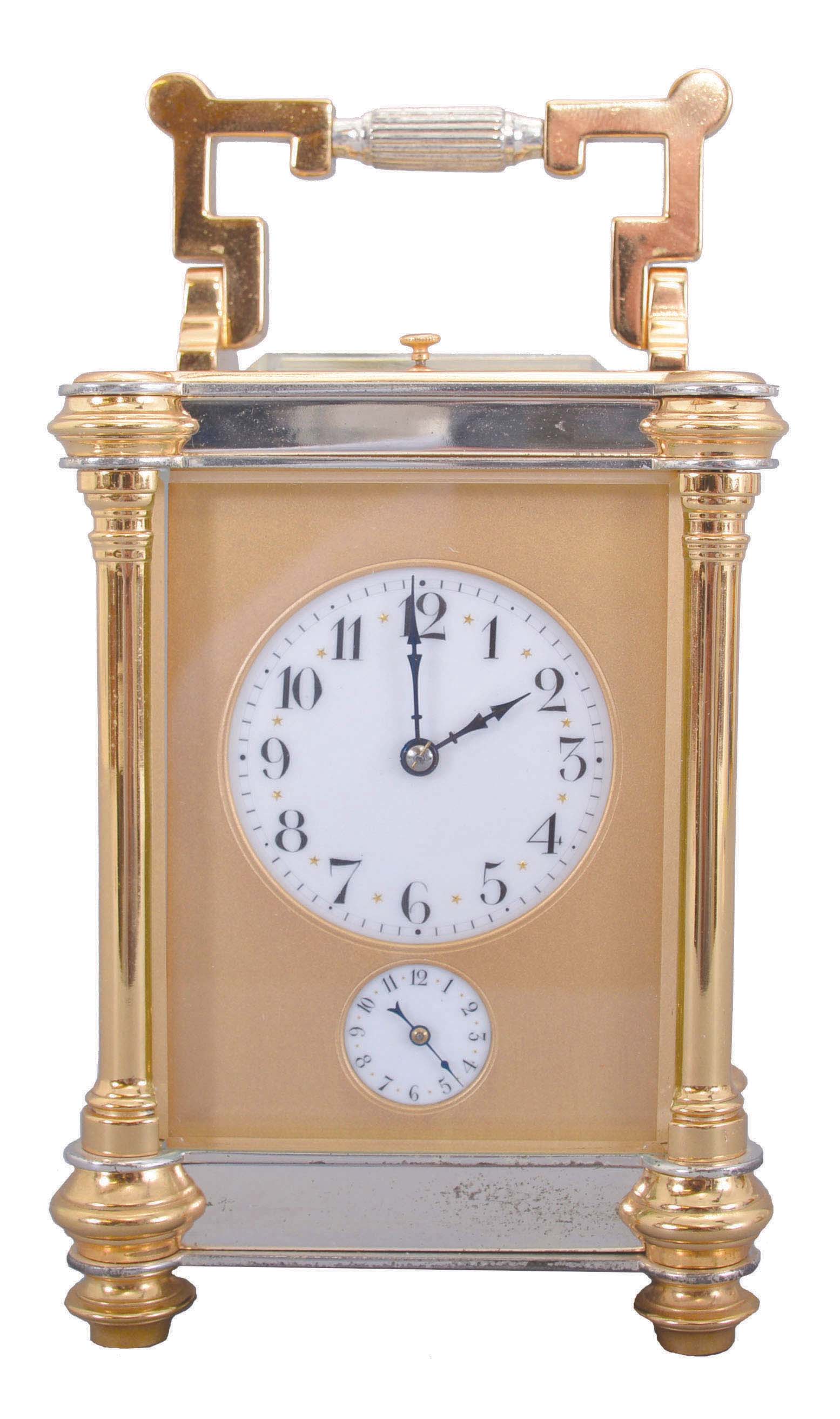 Jules Desjardin, France, carriage clock, time, strike, repeat &amp; alarm, in a two-tone round column case, with round white dials behind a frosted gilt mask with the Arabic numerals separated by gold stars at the half hour positions. 18462 — Antique Clocks Price Guide