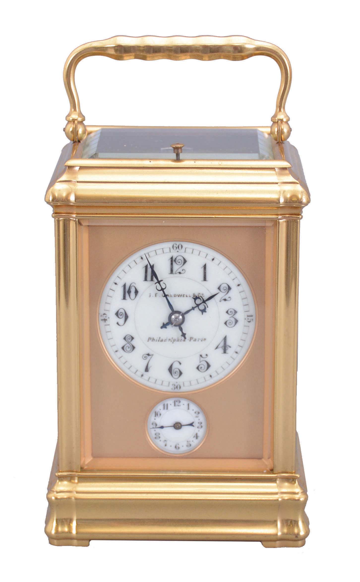 France, Carriage Clock, Grand Sonnerie, and repeat, with alarm, in a gilt gorge case, serial 5581, 8 day, lever escapement silvered platform escapement, case with cream colored dials, top dial signed J. E. Caldwell &amp; Co. against a gilt mask, Philadelphia- Paris. — Antique Clocks Price Guide