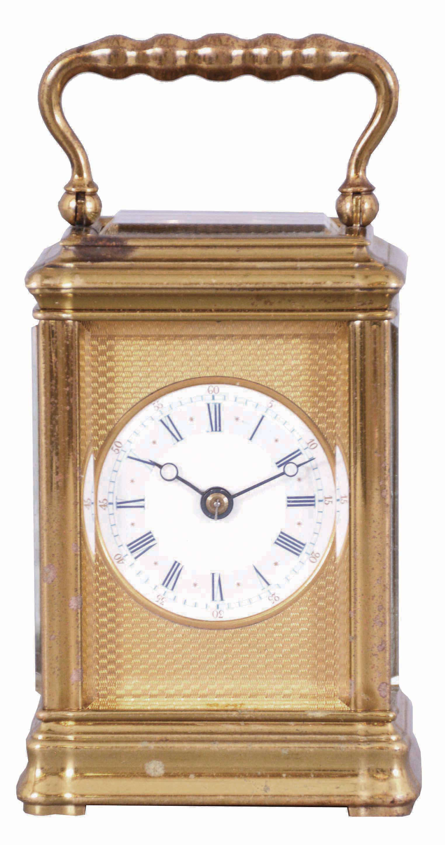 Breguet, Paris, a 3/4 size striking carriage clock, glazed brass Gorge case, white enamel dial with blue Roman numerals on a gray ground, with gold, Arabic numeral, outer five minute markers, blued steel Breguet style hands, and with engine turned, gilt mask, the top glass also backed with a matching, engine turned plate with oval aperture for viewing the escapement, 8 day, two train movement with lever platform and cut bimetallic balance, striking the hour and half hour on a bell, serial #1316 — Antique Clocks Price Guide
