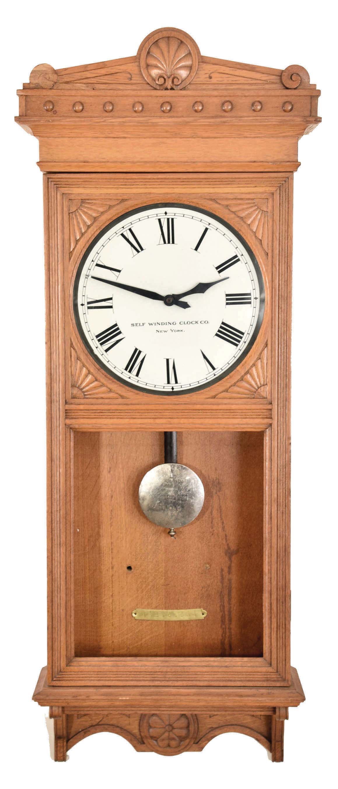Self Winding Clock Co., New York, "No. 18", wall regulator in an oak case — Antique Clocks Price Guide