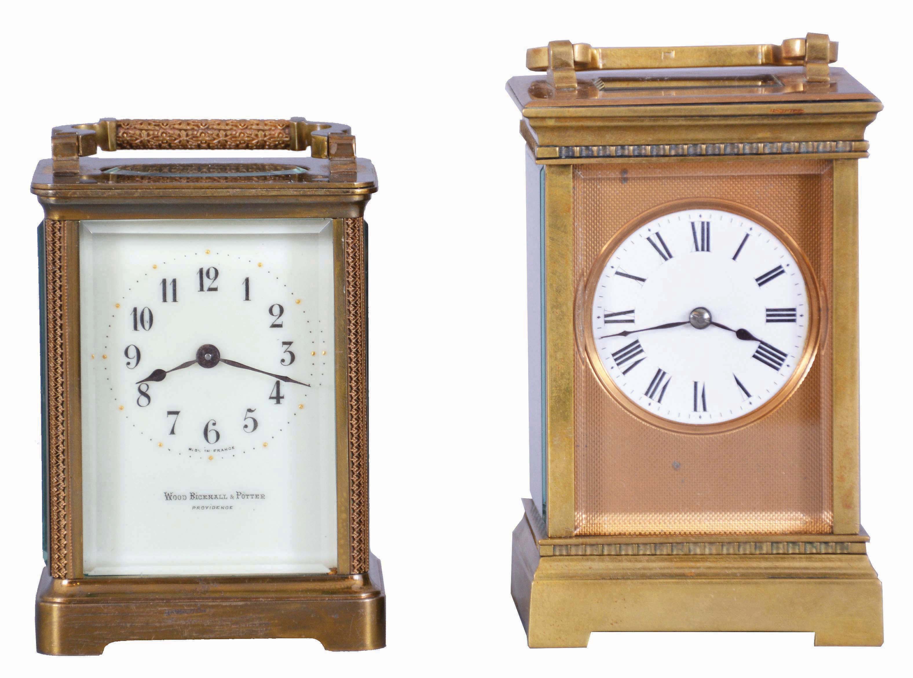 Clocks- 2 (Two) Carriage, both French 8 day timepieces: (1) gilt Anglaise case, Roman numeral white enamel dial with engine turned, gilt mask, and lever platform; (2) fret ornamented Obis case, Arabic numeral white enamel dial signed "Wood, Bicknell &amp; Potter, Providence", with cylinder platform — Antique Clocks Price Guide