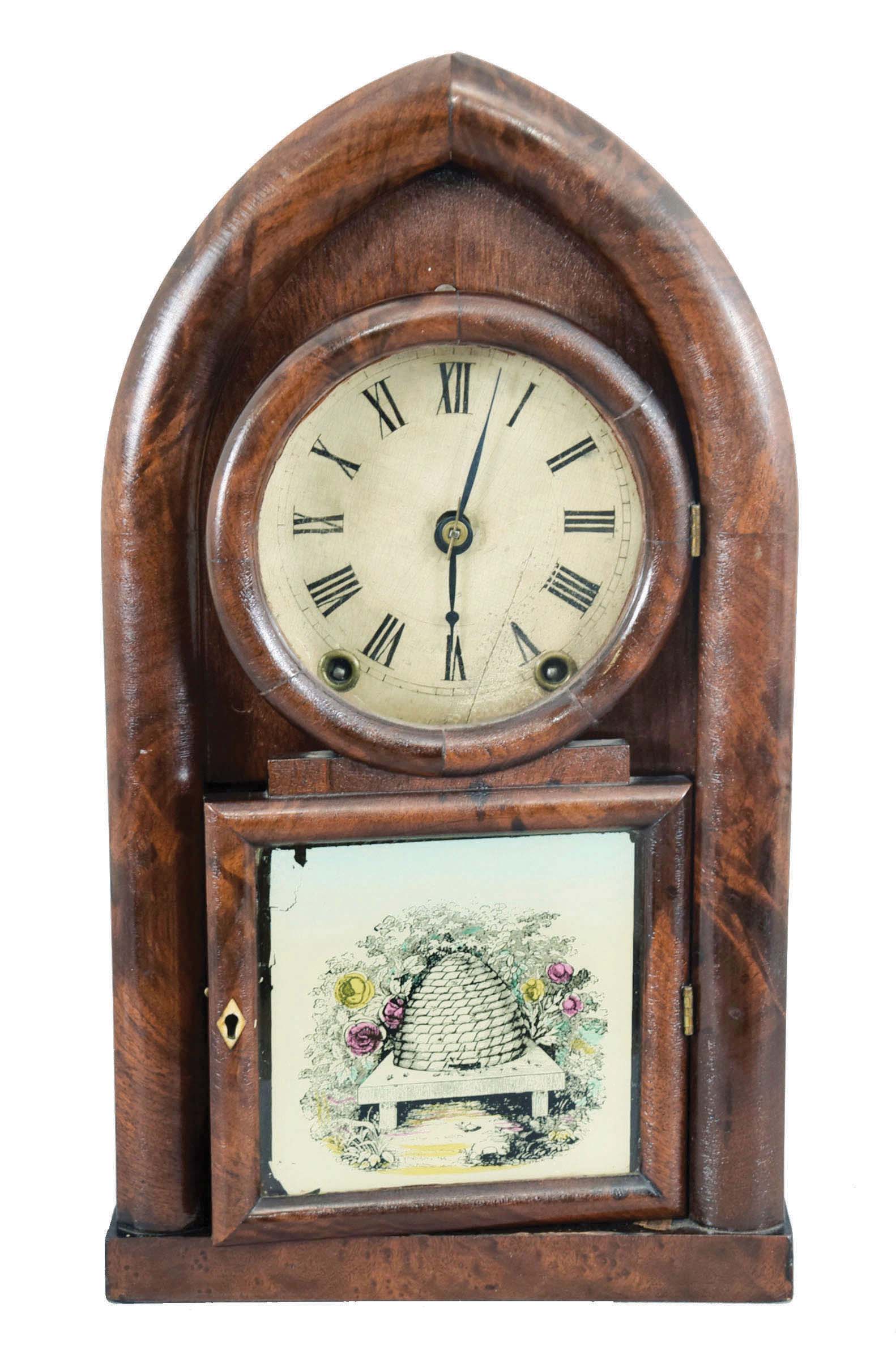 Brewster &amp; Ingrahams, Bristol, Conn., 8 day, time and strike, spring brass movement round gothic or beehive clock. — Antique Clocks Price Guide