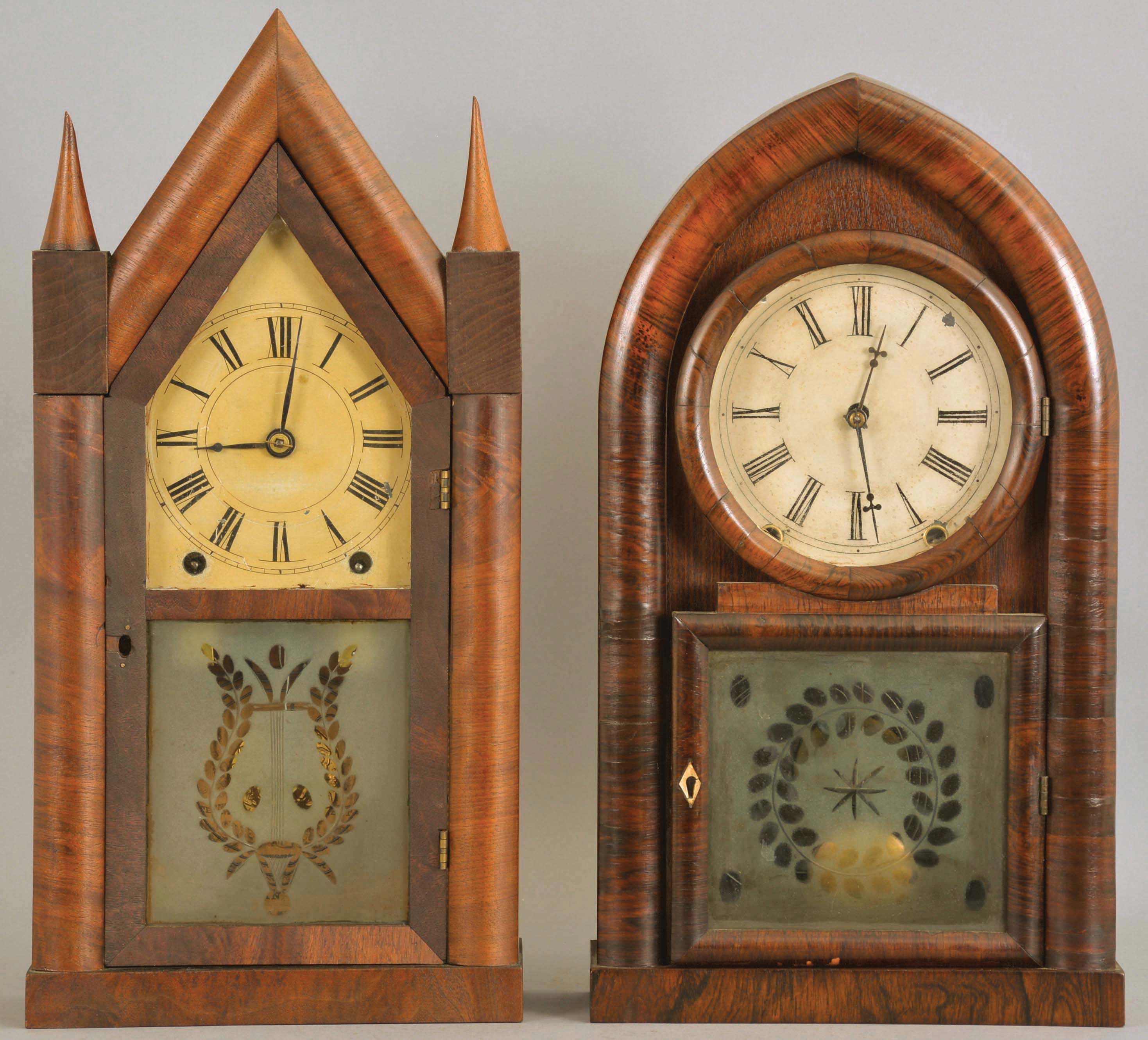 Clocks- 2 (Two): (1) Jonathan Frost, Reading, Mass. (by Brewster &amp; Ingrahams, Bristol, Conn. and sold by Frost), 8 day, time and strike, spring brass movement Sharp Gothic or Steeple clock; (2) Brewster &amp; Ingrahams, Bristol, Conn., 8 day, time and strike, spring brass movement Round Gothic or Beehive shelf clock. — Antique Clocks Price Guide