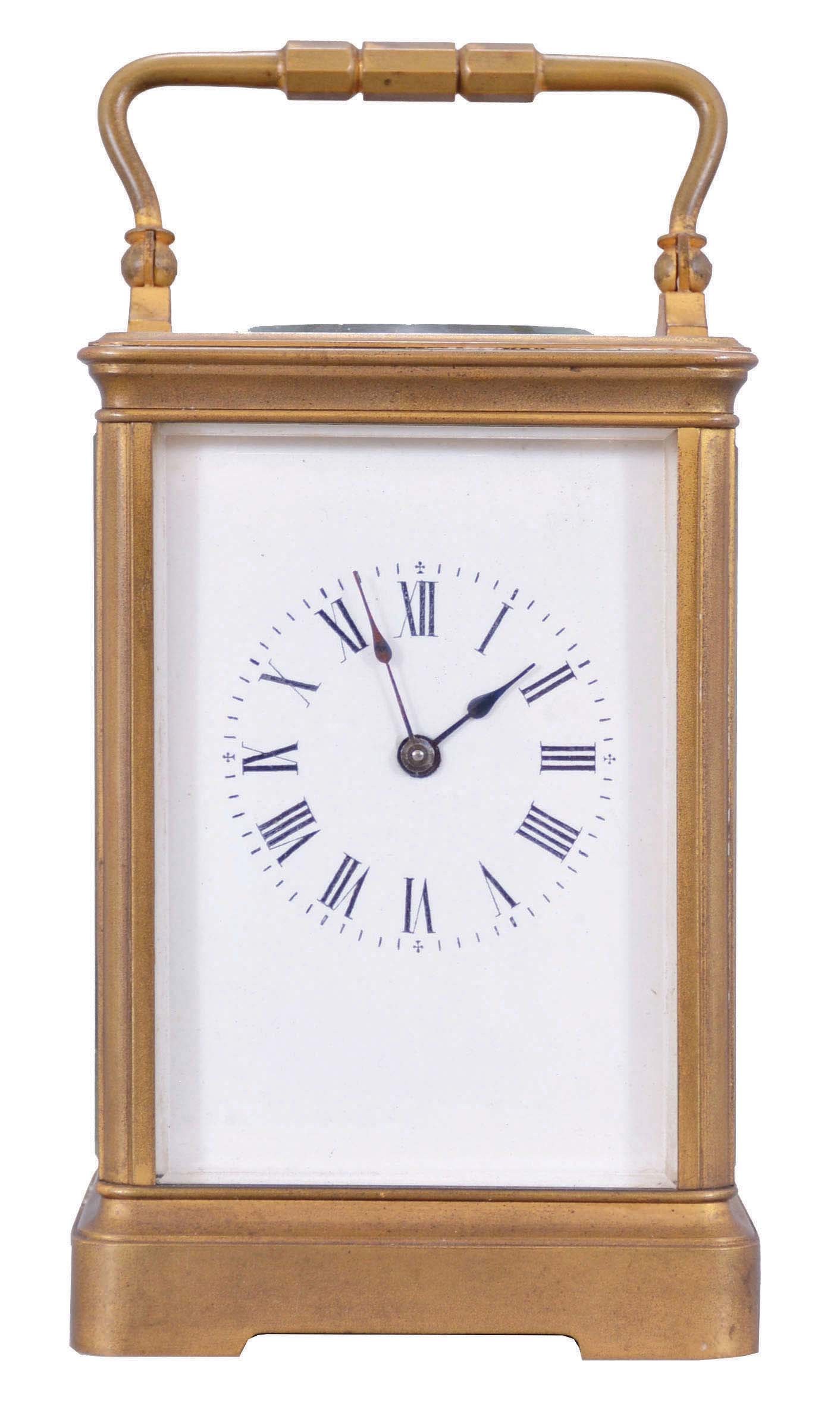 Boston Clock Co., Boston, Mass., 8 day, time and strike tandem-wind carriage clock with balance platform mounted vertically on the back plate. — Antique Clocks Price Guide