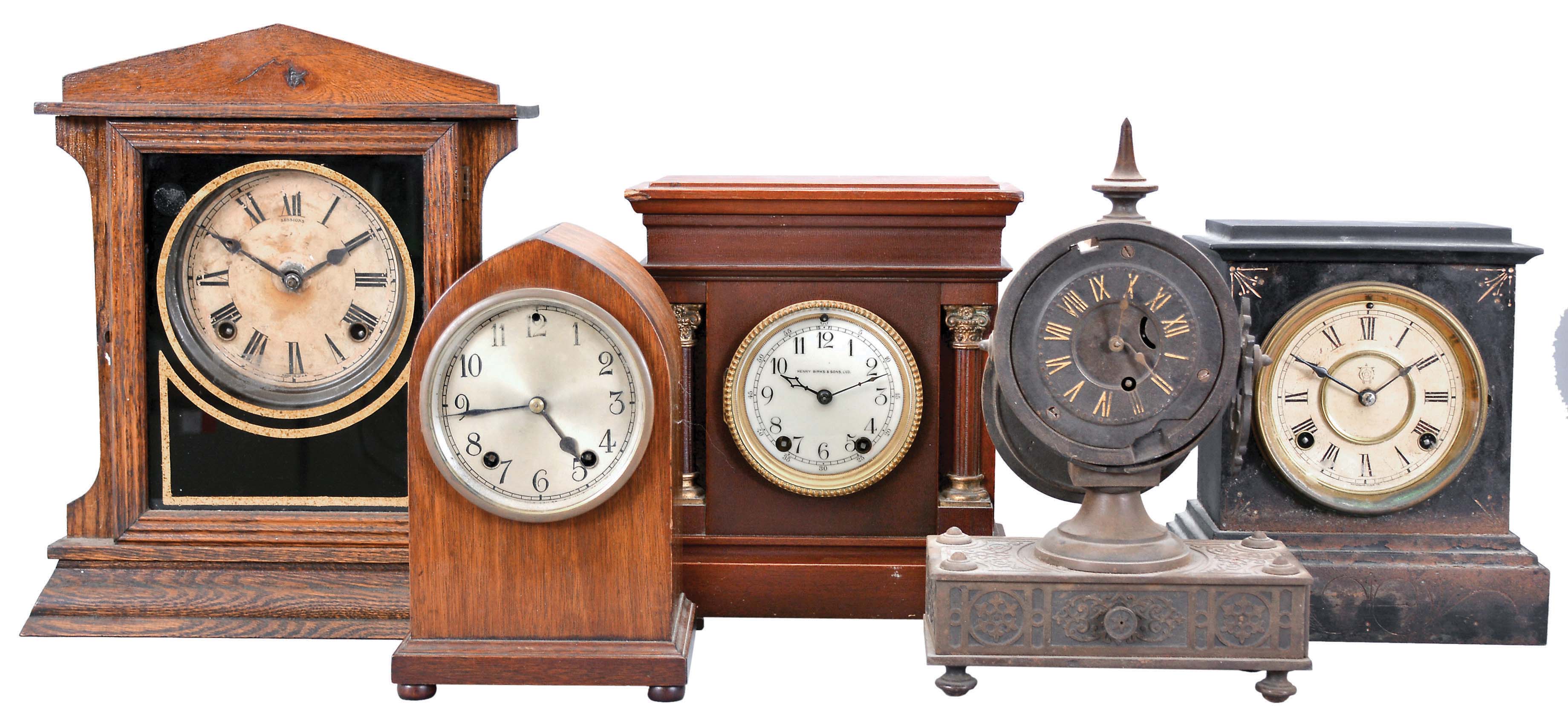 Clocks- 5 (Five) Mantel: small time and strike gothic in a mahogany case, a Sessions time and strike in an oak case, a Waterbury time and strike in a black enameled iron case, a Seth Thomas time and strike in a mahogany case sold by Henry Birks &amp; Sons, and a time only "Tucker Bronze" in a cast iron case. — Antique Clocks Price Guide