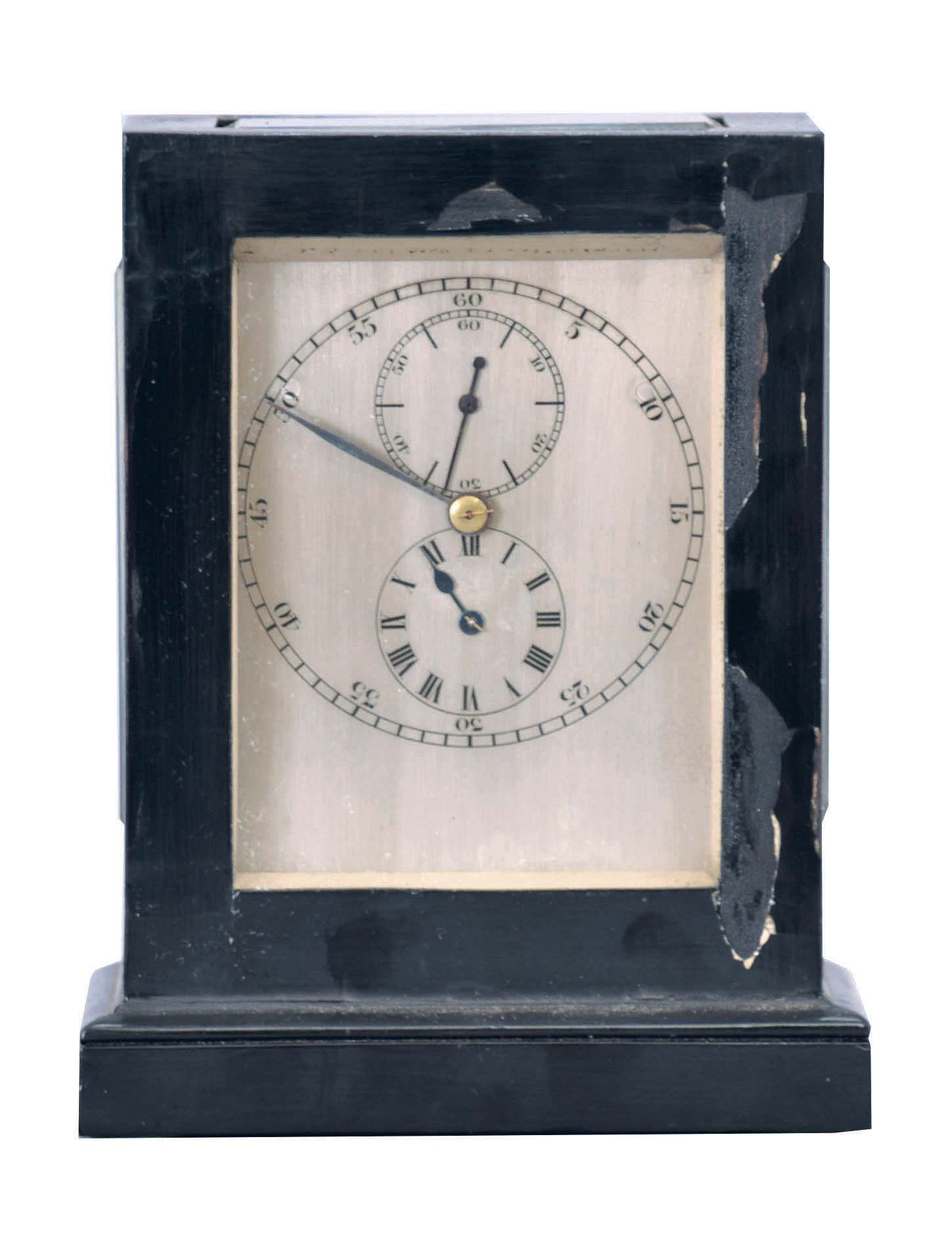 Bench made carriage clock with chronometer escapement and astronomical dial, ebonized, glazed mahogany case, silvered dial with separate chapters for hours, minutes, and seconds, blued steel hands, 8 day timepiece movement with chronometer platform, cut bimetallic balance with rim riveted to balance arm, and Earnshaw spring detent escapement — Antique Clocks Price Guide