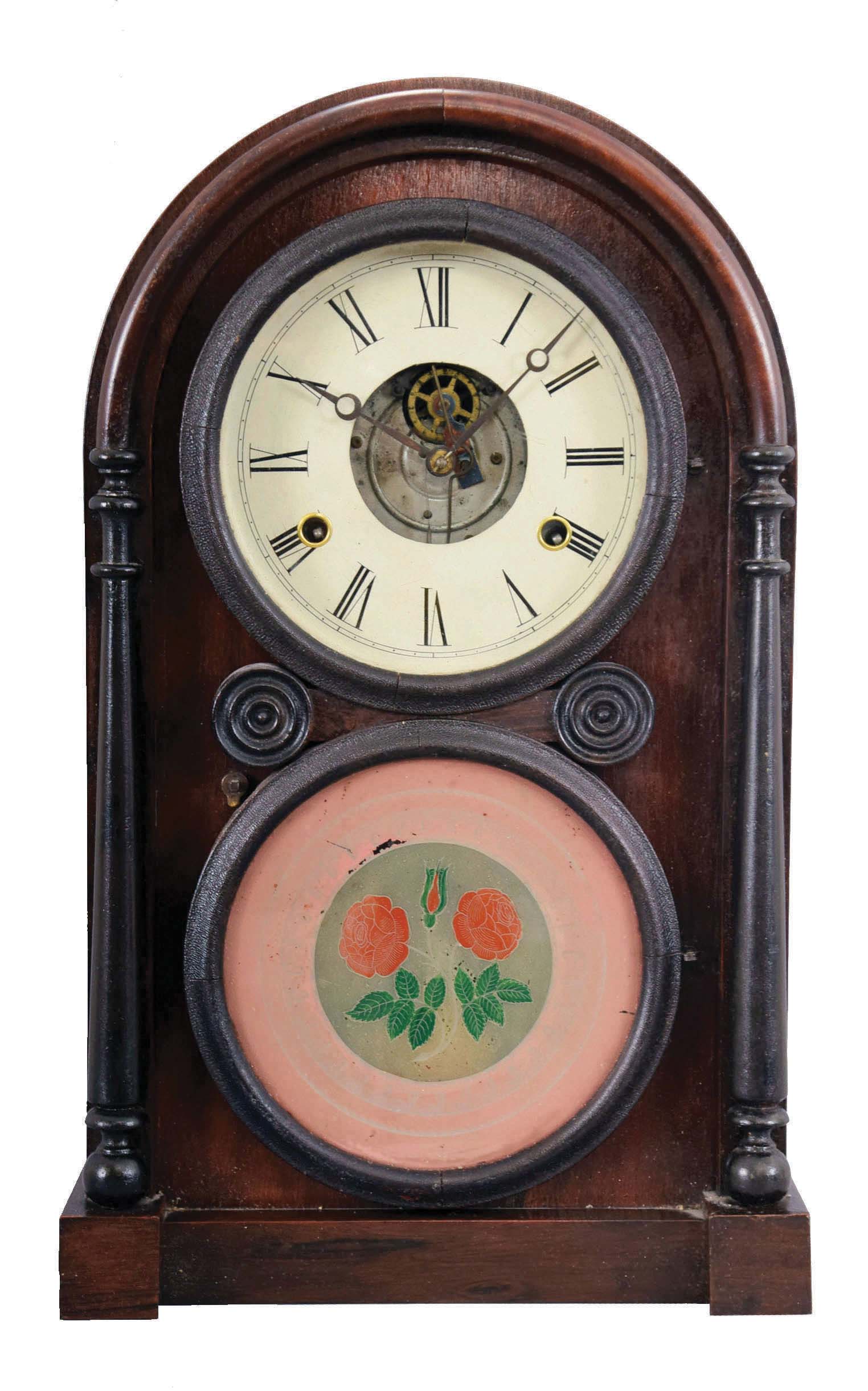 E. Ingraham &amp; Co., Bristol, Conn. early "Venetian" shelf clock with a spring driven, 8 day, time and strike Joseph Ives tin plate movement in a rosewood veneered case. This clock appears to be the same clock pictured on page 353 of Ken Roberts book entitled "The Contribution of Joseph Ives to Connecticut Clock Technology 1810-1862". — Antique Clocks Price Guide