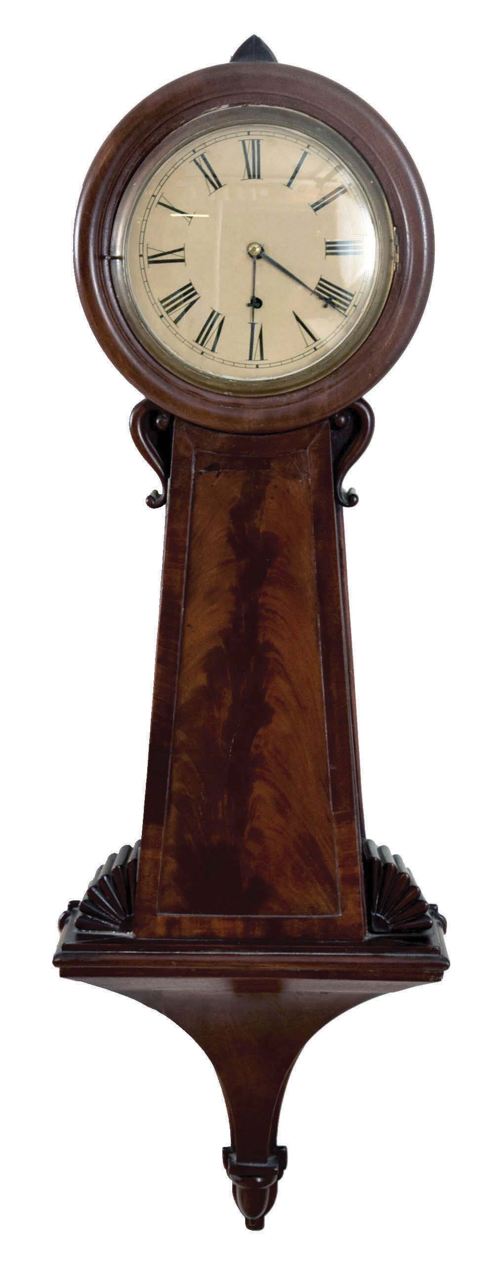 Unknown, Massachusetts, 8 day, weight brass movement patent or banjo timepiece. It is difficult to ascertain if this is a period clock or it was made from old parts. In any event it is an attractive timepiece. — Antique Clocks Price Guide