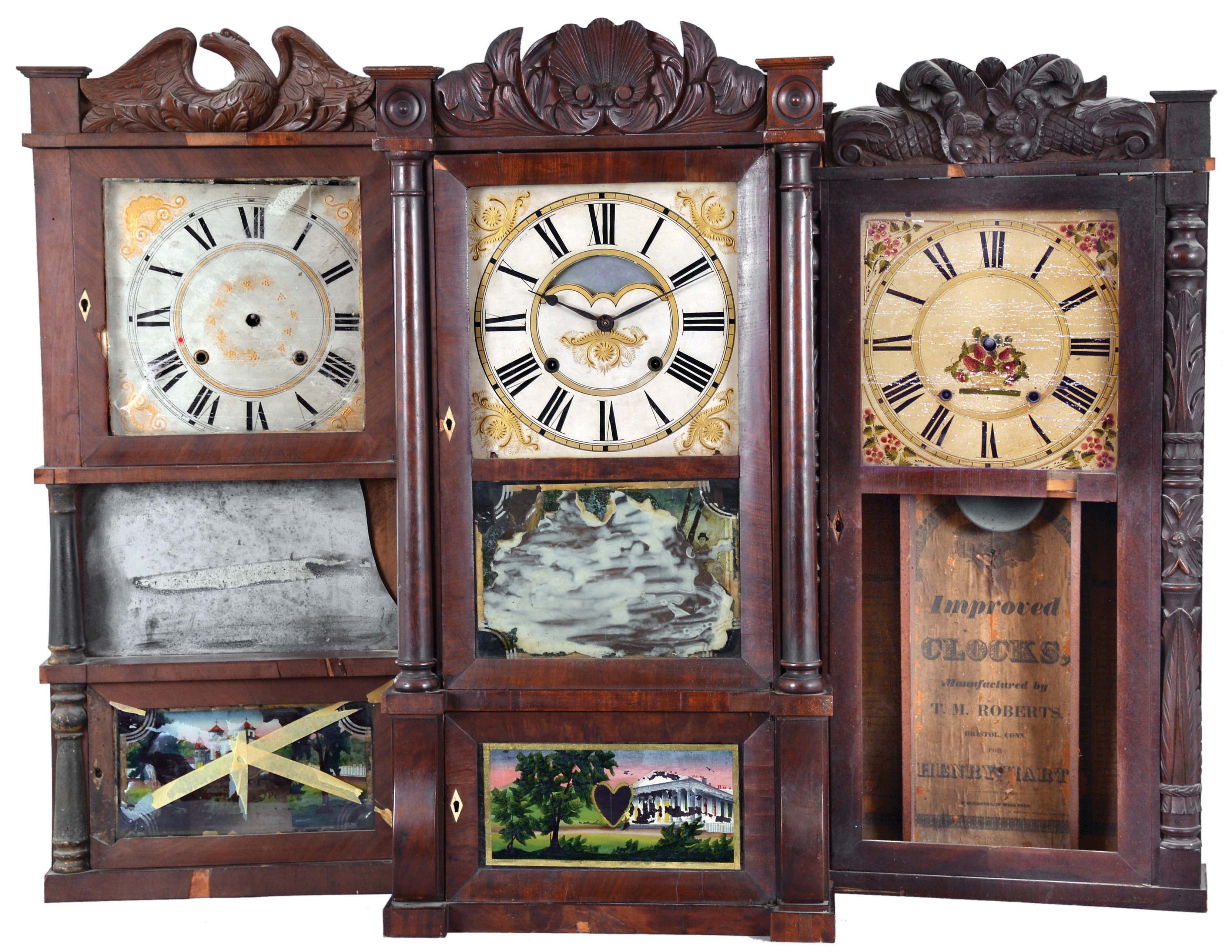 Clocks- 3 (Three): American shelf clocks: (1) Jared Arnold, Jr., Amber, NY, triple decker shelf clock with a weight driven, 8 day, time and strike strap brass movement in a mahogany veneered case with a carved eagle splat., c 1838; (2) T. M. Roberts (for Henry Hart), Bristol, Conn., carved column and splat shelf clock with a weight driven 30 hour time and strike wood movement in a mahogany veneered case, c1835. (3) Birge &amp; Gilbert, Bristol, Conn., full column and carved splat shelf clock with a weight driven, 8 day, time and strike strap brass movement in a mahogany veneered case, c1838. — Antique Clocks Price Guide