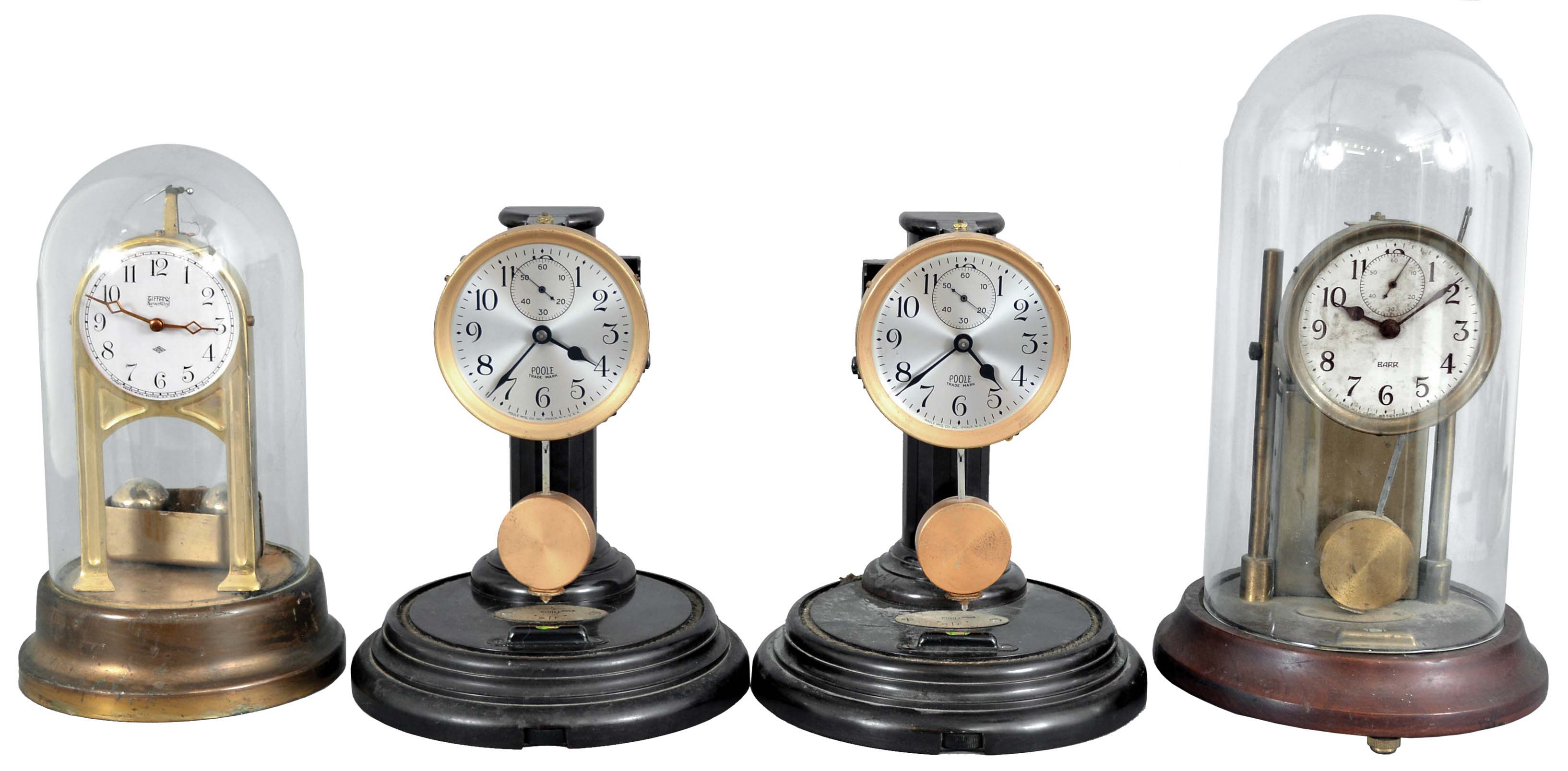 Clocks- 4 (Four) Electro-mechanical: two Poole Mfg. Co., New York, "Executive", electro-mechanical battery-driven mantel timepieces, both with bakelite cases and silvered dials; Barr electro-mechanical battery-driven mantel timepiece with wood base and silvered dial; Tiffany "Neverwind" electro-mechanical timepiece. — Antique Clocks Price Guide