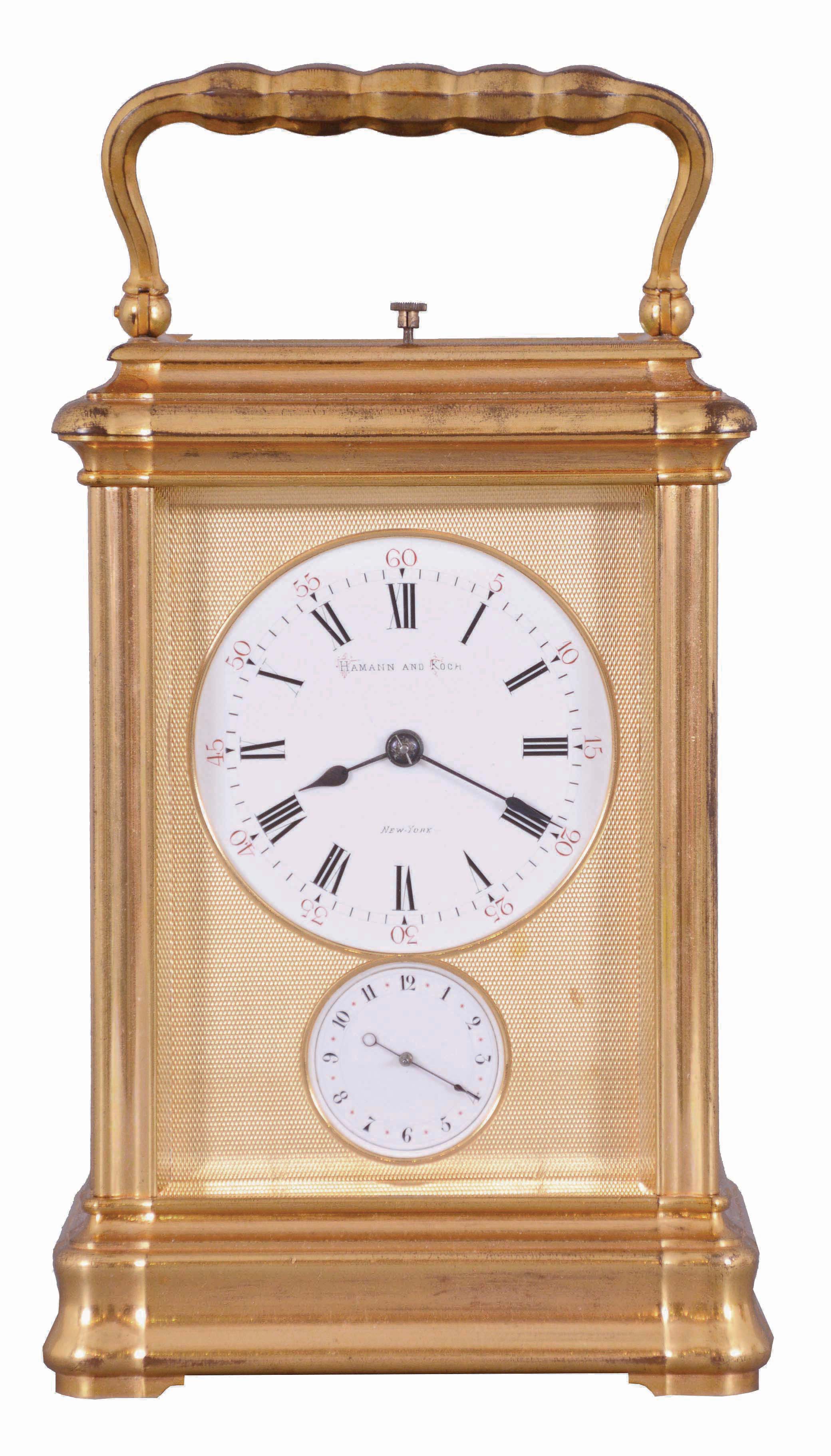 Drocourt, Paris, for Hamann &amp; Koch, New York, an impressive, Gorge cased, grand sonnerie striking giant carriage clock, the massive gilt case with bevelled glasses, the top glass with engine turned mask with an oval aperture for viewing the escapement, Roman numeral white enamel dial also with gilt, engine turned mask, blued steel spade hands, 8 day time, strike, and alarm movement with large lever platform and cut, bimetallic balance, sounding grand or petit quarters in passing, and repeating the last hour and quarter on demand, the front plate marked "H.L.", gong bases marked "F.D." within an oval, serial #1813 — Antique Clocks Price Guide