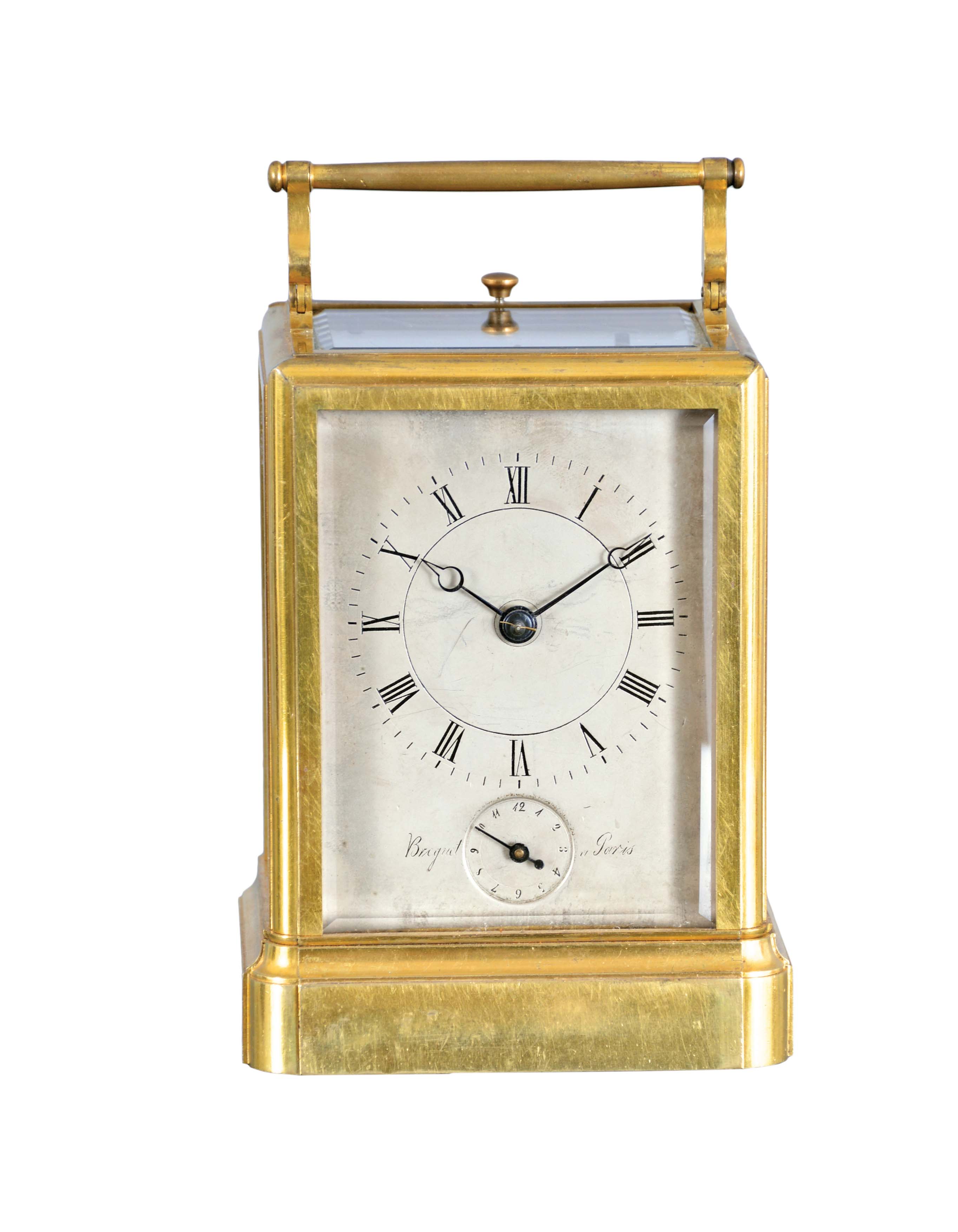 France or Switzerland, a rare, early, petit sonnerie striking carriage clock with alarm and travel case, signed Breguet, gilt, glazed, one piece case with molded base, Roman numeral silvered dial with blued steel Breguet style hands, subsidiary alarm chapter, and engraved "Breguet, a Paris", 8 day, time and strike movement with both trains driven by a single barrel, striking the last quarter in passing, and with grand sonnerie repeating on blued, wire gongs, the polished steel strikework mounted to the back plate, and also bearing a silvered plate engraved "Breguet", duplex platform escapement, with two piece steel escape wheel and brass balance, and with alarm striking on a bell in the base, contained in its original wooden, gilt stamped leather covered case with gilt hardware — Antique Clocks Price Guide