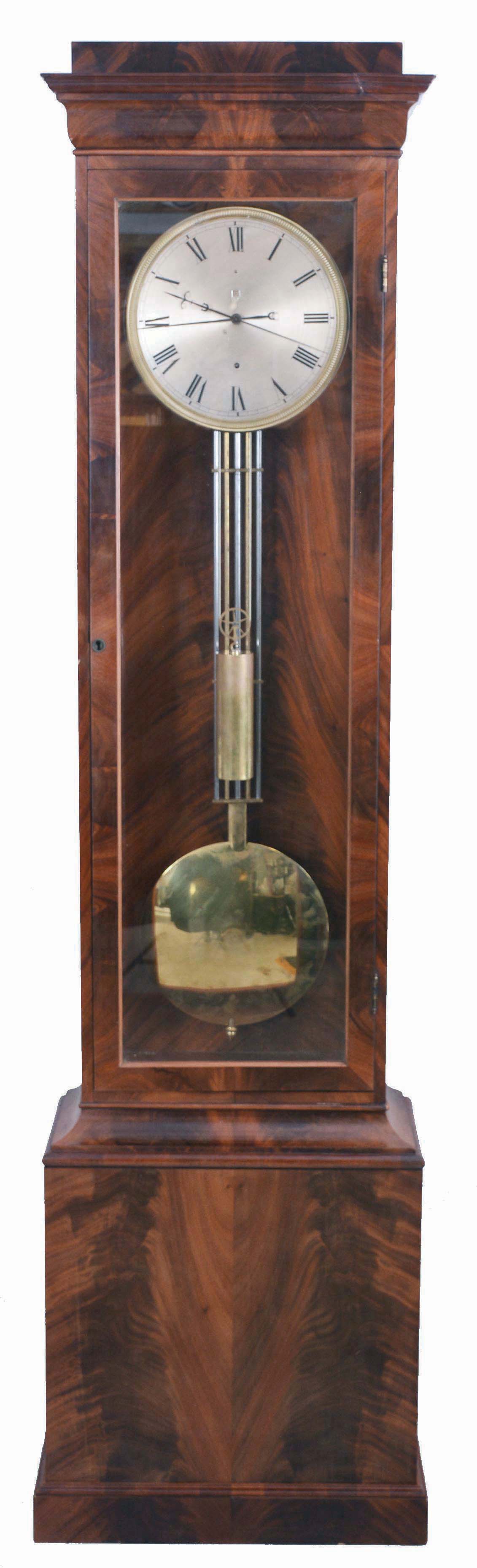 Austria, jewelers standing regulator, 30 day, time only, weight driven movement with grid iron pendulum and sweep seconds hand in a mahogany and mahogany veneer case with silvered dial and calendar aperture below 12 — Antique Clocks Price Guide