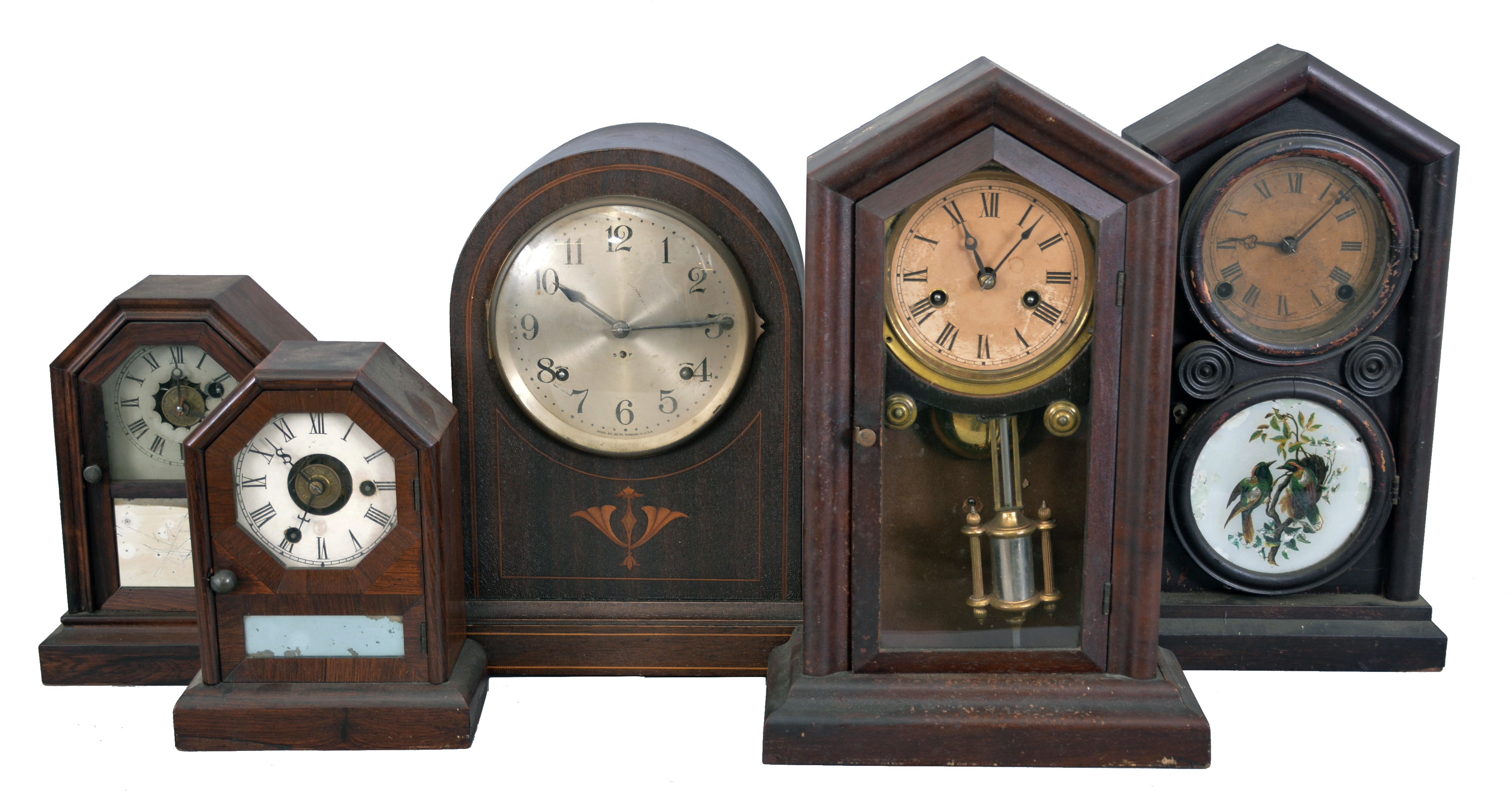Clocks- 15 (Fifteen) American and European shelf clocks: including a Seth Thomas "Sonora" chime clock, two 30-hour cottage clocks, two Ingraham "Doric" clocks, a Junghans electro-mechanical clock, a brass-cased French clock sold by Tilden Thurber Co., a weight driven ogee clock, a sharp gothic clock, a French time-only mantel clock, a modern chiming bracket clock, two 30-hour clocks by Chauncey Jerome, a small pillar &amp; scroll clock, and a wall clock by the Self-Winding Clock Company. — Antique Clocks Price Guide