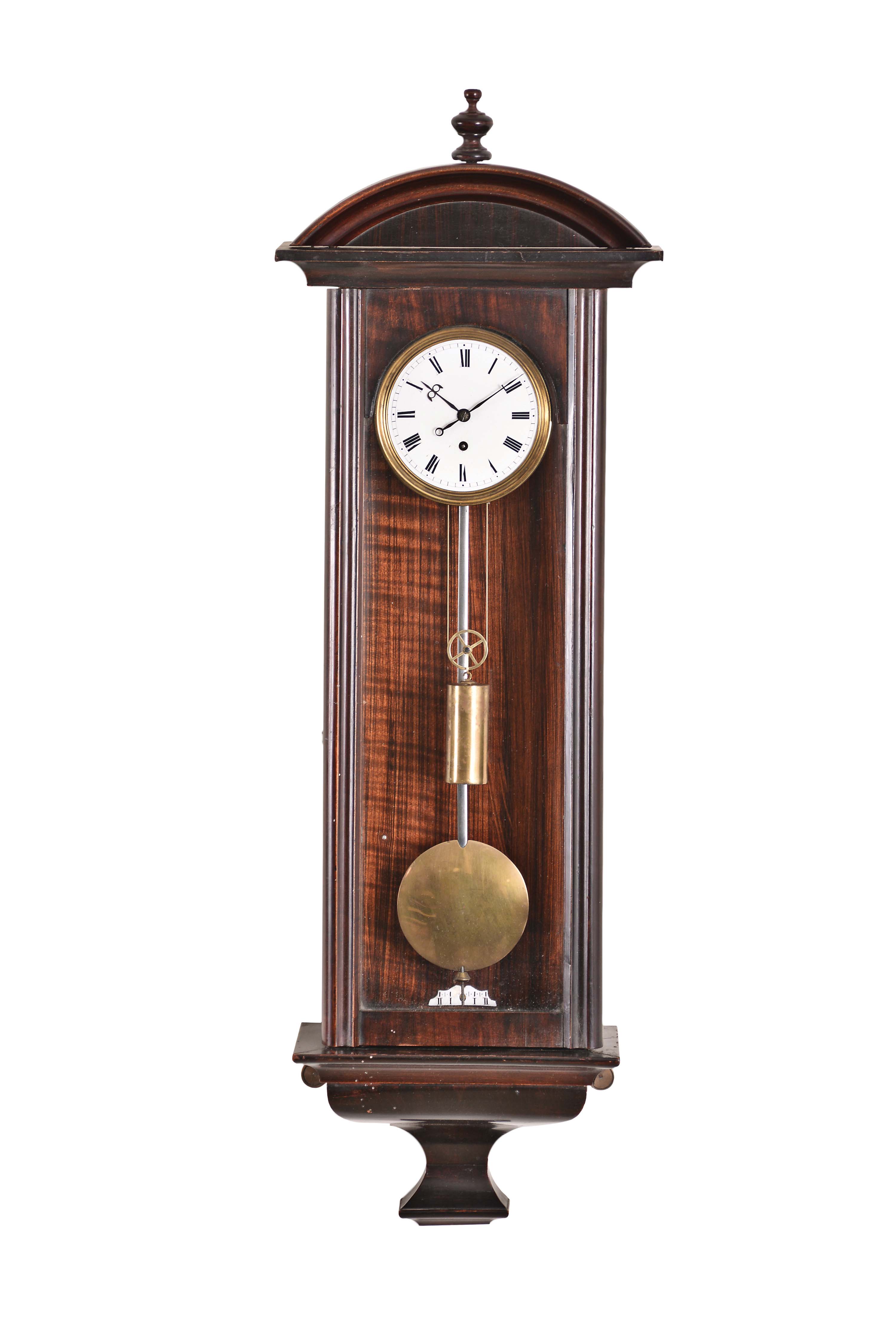 Austria, a miniature, hanging Vienna timepiece, mahoganized, 3 light case with deeply incurved bottom bracket, molded door and cornice, and with arch top crest, Roman numeral white enamel dial with brass bezel, and blued steel hands, 30 hour, weight driven movement with dead beat escapement and silk thread suspension, brass pendulum with steel rod, and brass clad weight — Antique Clocks Price Guide