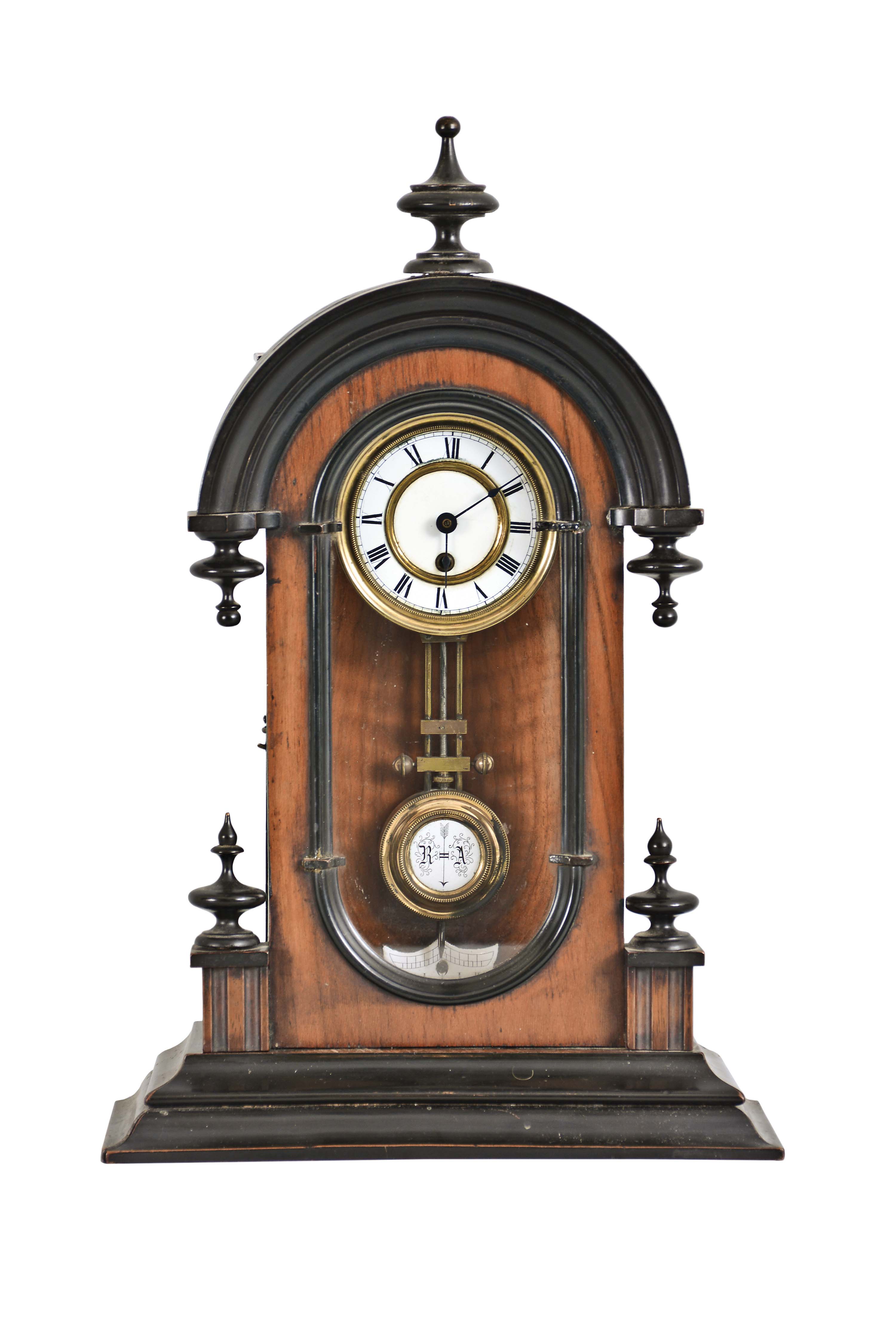 Germany, a miniature Vienna style shelf timepiece, walnut arch top case with ebonized base and arch moldings, turned, ebonized drops and finials, the door with glazed, oblong, molded aperture, Roman numeral white enamel dial, blued steel spade hands, 8 day time only spring driven movement, and faux compensated R/A pendulum — Antique Clocks Price Guide