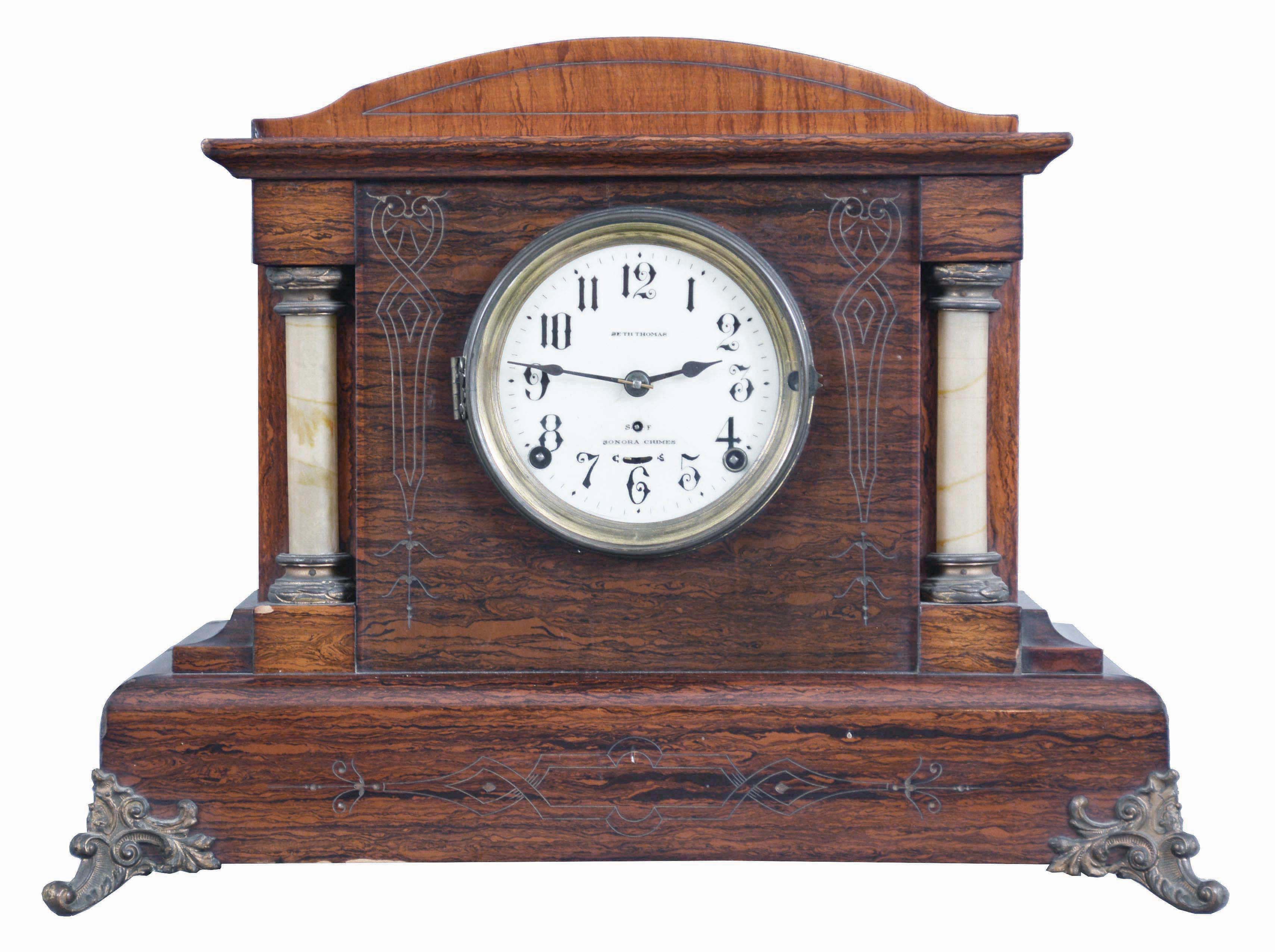 Seth Thomas Clock Co., Thomaston, Conn., "Chime Clock No. 4" shelf clock with a spring driven, 8 day time and 4 Bell Sonora strike movement in a rosewood adamantine finish. — Antique Clocks Price Guide