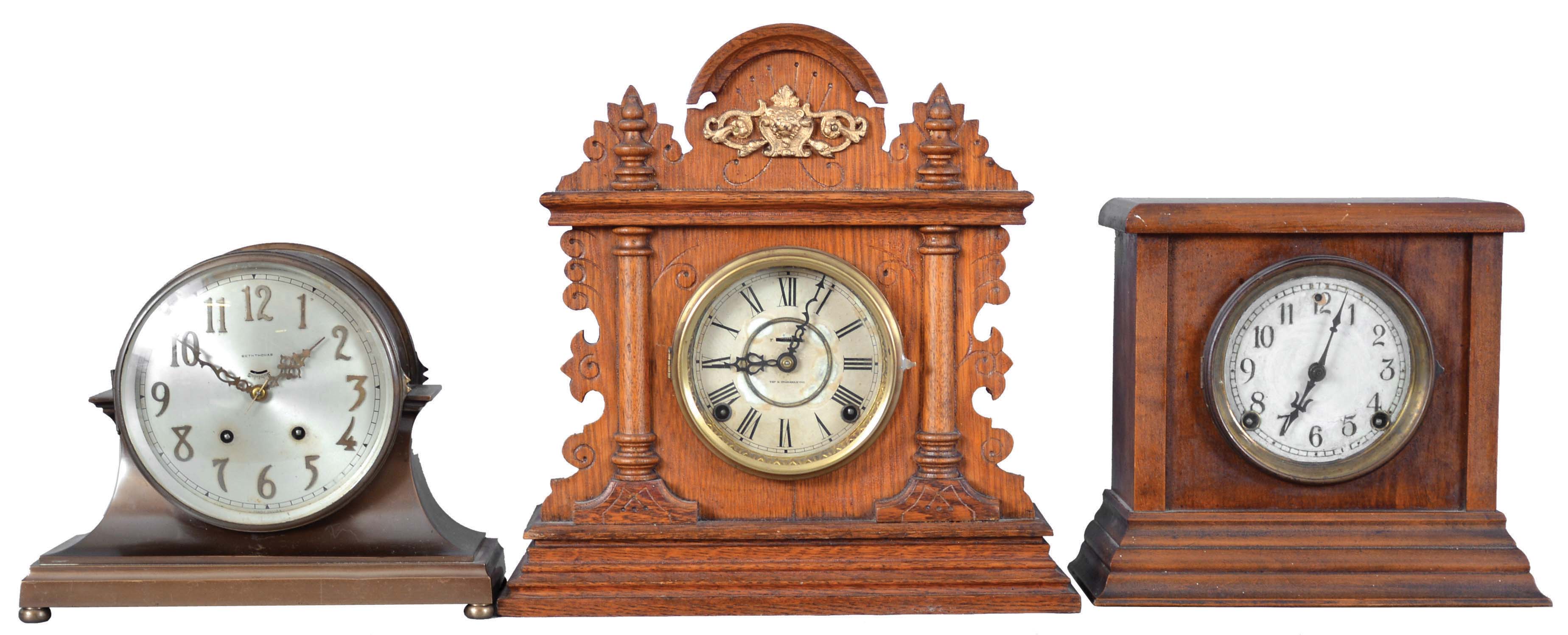 Clocks- 3 (Three) Mantel: Seth Thomas "Celtic" time and strike metal case mantel clock, Sessions time and strike mantel clock in a pine case, and an Ingraham "Cabinet No. 3" time and strike mantel clock. — Antique Clocks Price Guide