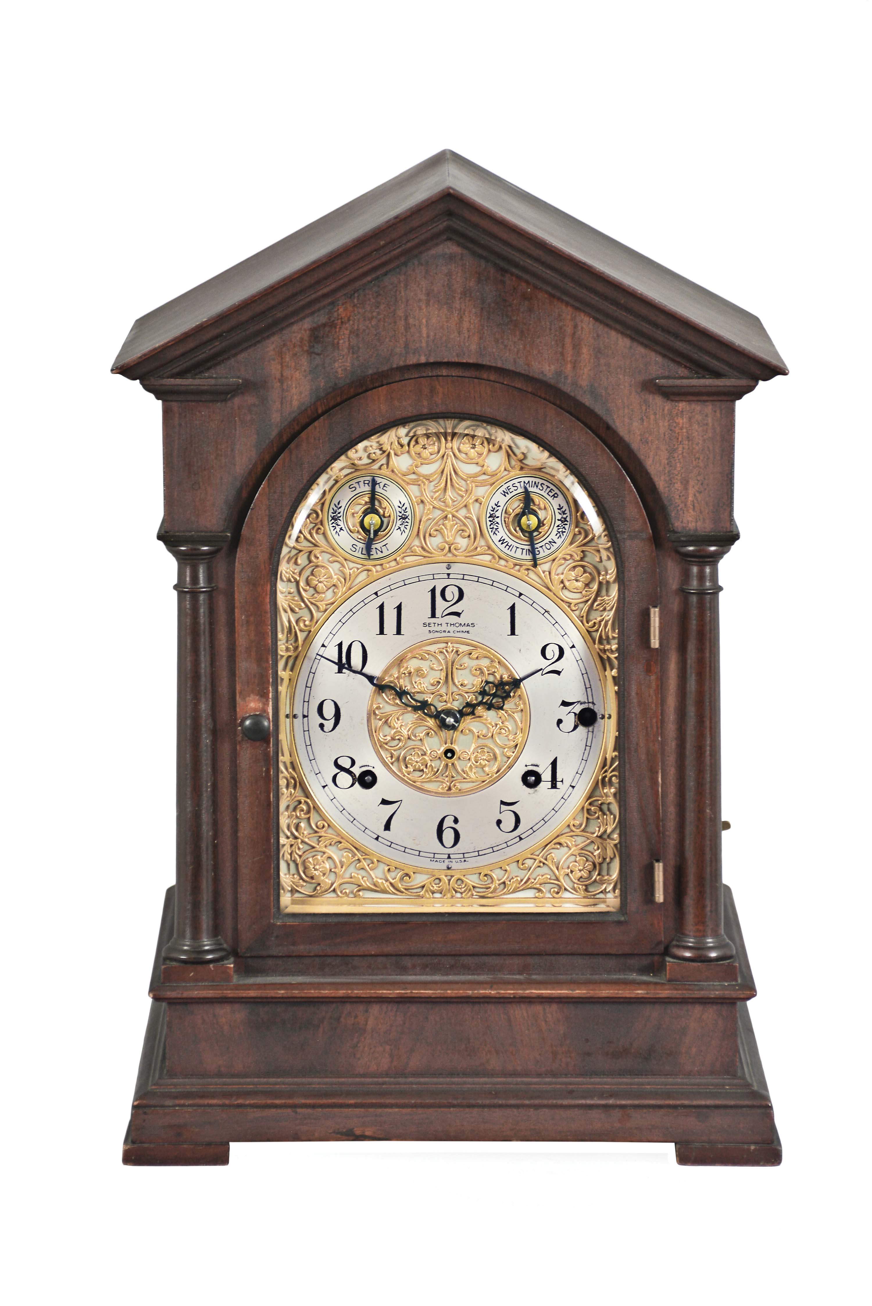 Seth Thomas Clock Co., Thomaston, Conn., "Chime Clock No. 2001" with a spring driven, 8 day time and 8 Bell Sonora strike movement in a mahogany case. — Antique Clocks Price Guide