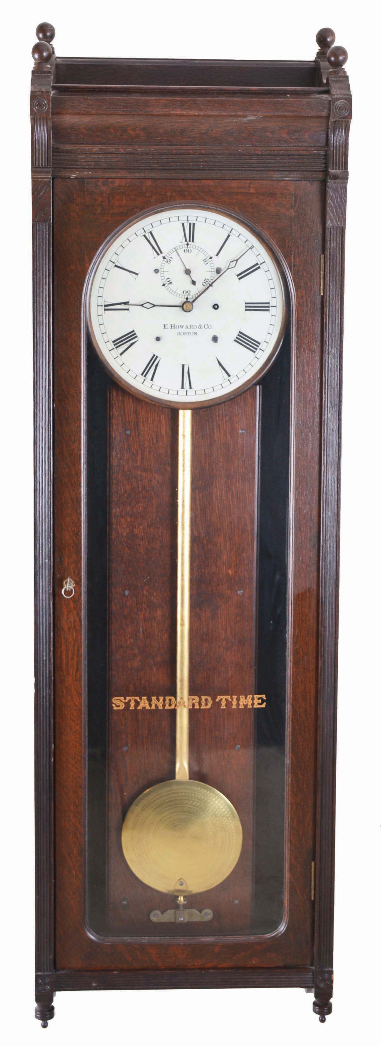 E. Howard &amp; Co., Boston, Mass., "Regulator No. 89", wall clock, 8 day, time only weight driven movement in a oak case with 12 inch, Roman numeral painted dial — Antique Clocks Price Guide