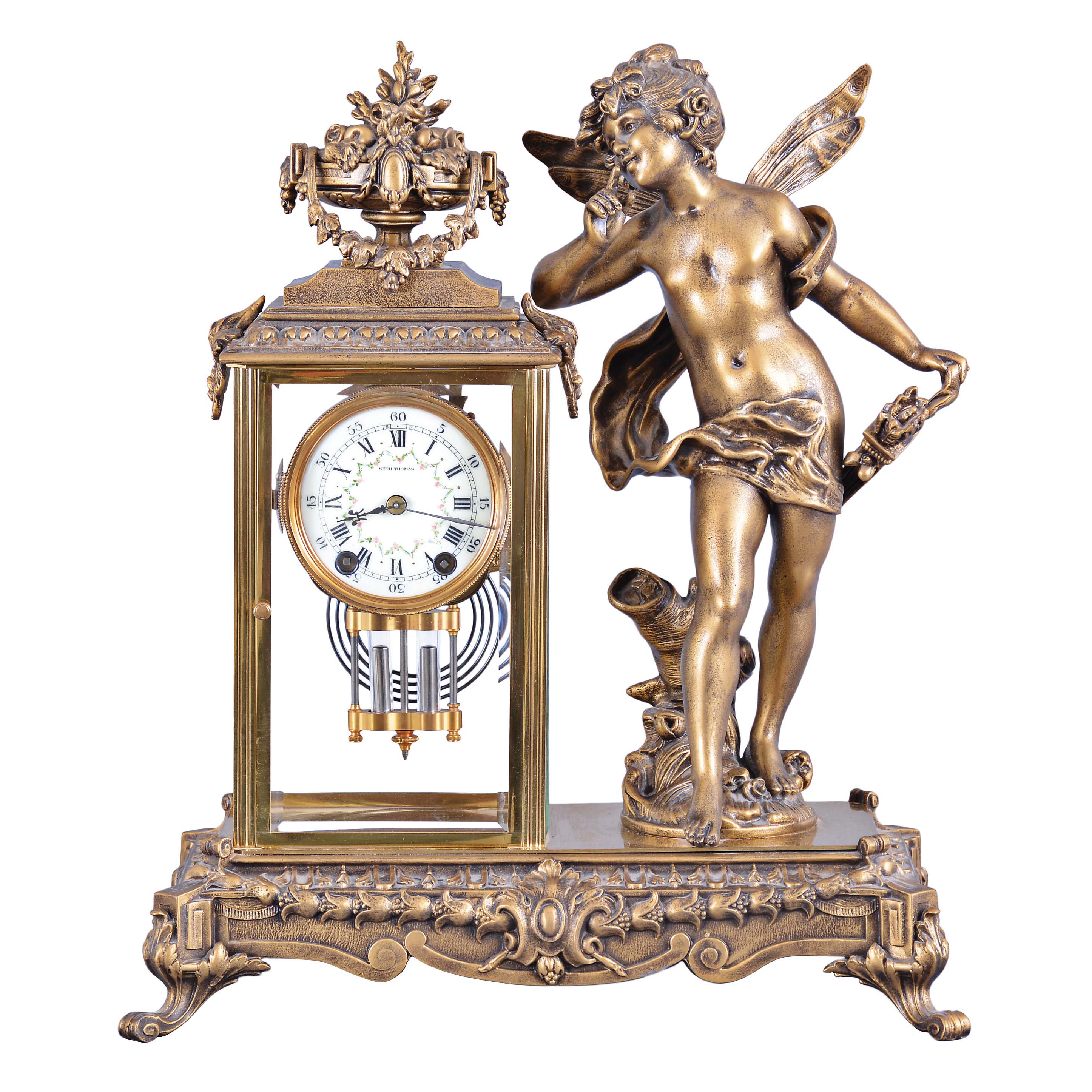 Seth Thomas Clock Co., Thomaston, Conn., "Cupid Empire No. 24", 15 day, time and strike, spring brass movement crystal regulator mantel clock. — Antique Clocks Price Guide