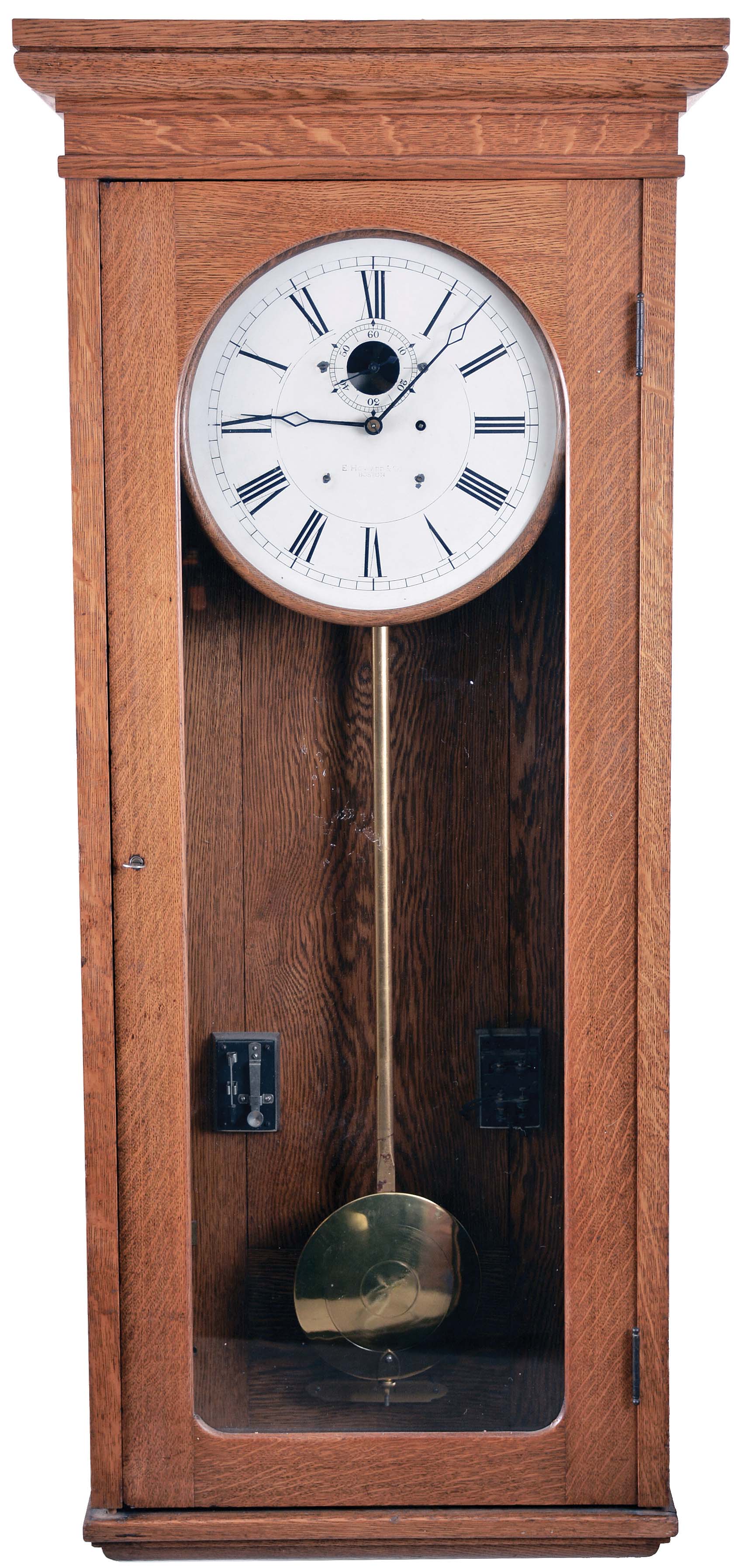 E. Howard &amp; Co., Boston, Mass., "Program Clock", wall clock, 8 day, time only, weight driven movement in an oak case with attached electrical components to operate a system of bells, buzzers or whistle blowing devices and a painted metal dial — Antique Clocks Price Guide