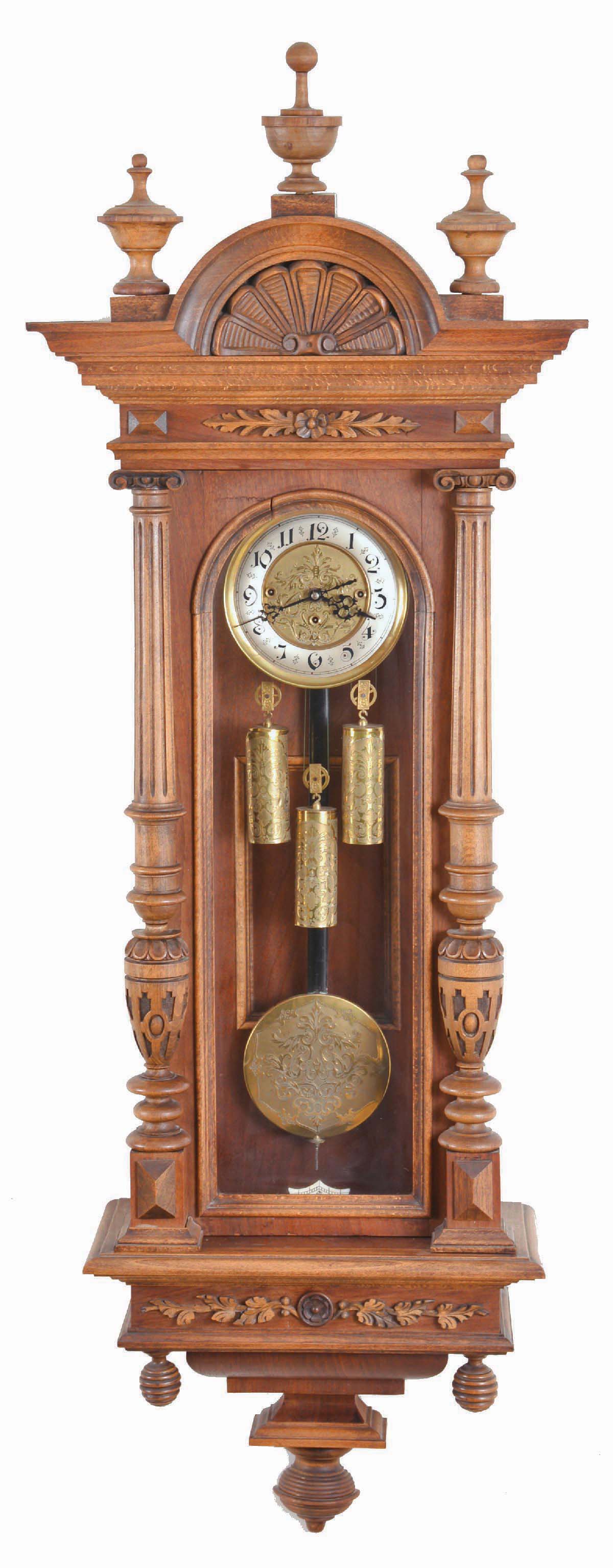 Germany / Austria, a "Vienna" regulator, grand sonnerie, 3-weight with matched pattern weights, dial and pendulum, and in a well made mixed hardwood and walnut veneer case with carved &amp; reeded splt columns to the side of the case and with "built-in" top. The silvered brass chapter ring with Arabic numerals. — Antique Clocks Price Guide