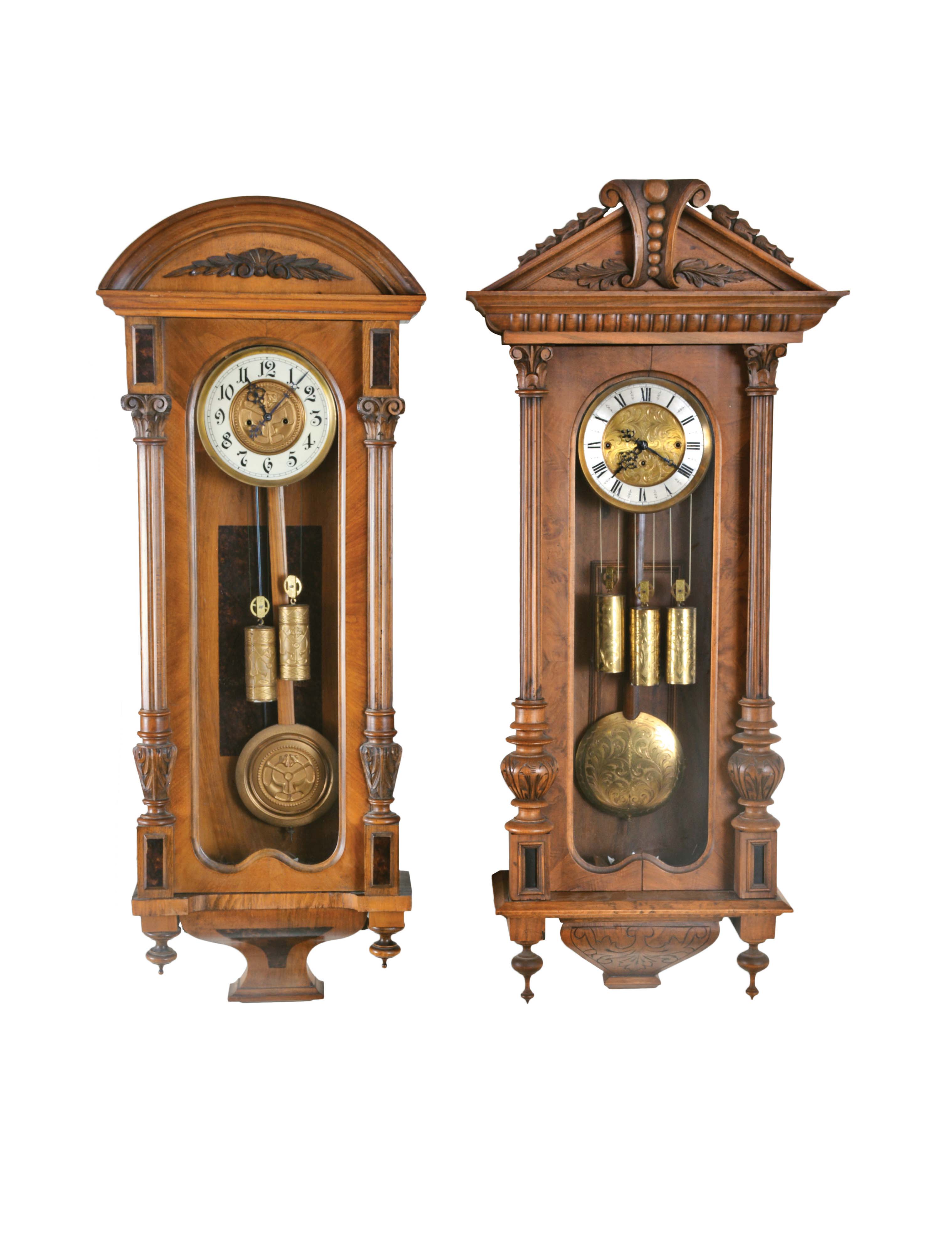 Clocks- 2 (Two) Vienna Regulators, engraved brass weights and pendulum, in carved walnut cases: (1) two weight, time and strike; (2) three weight, grand sonnerie — Antique Clocks Price Guide