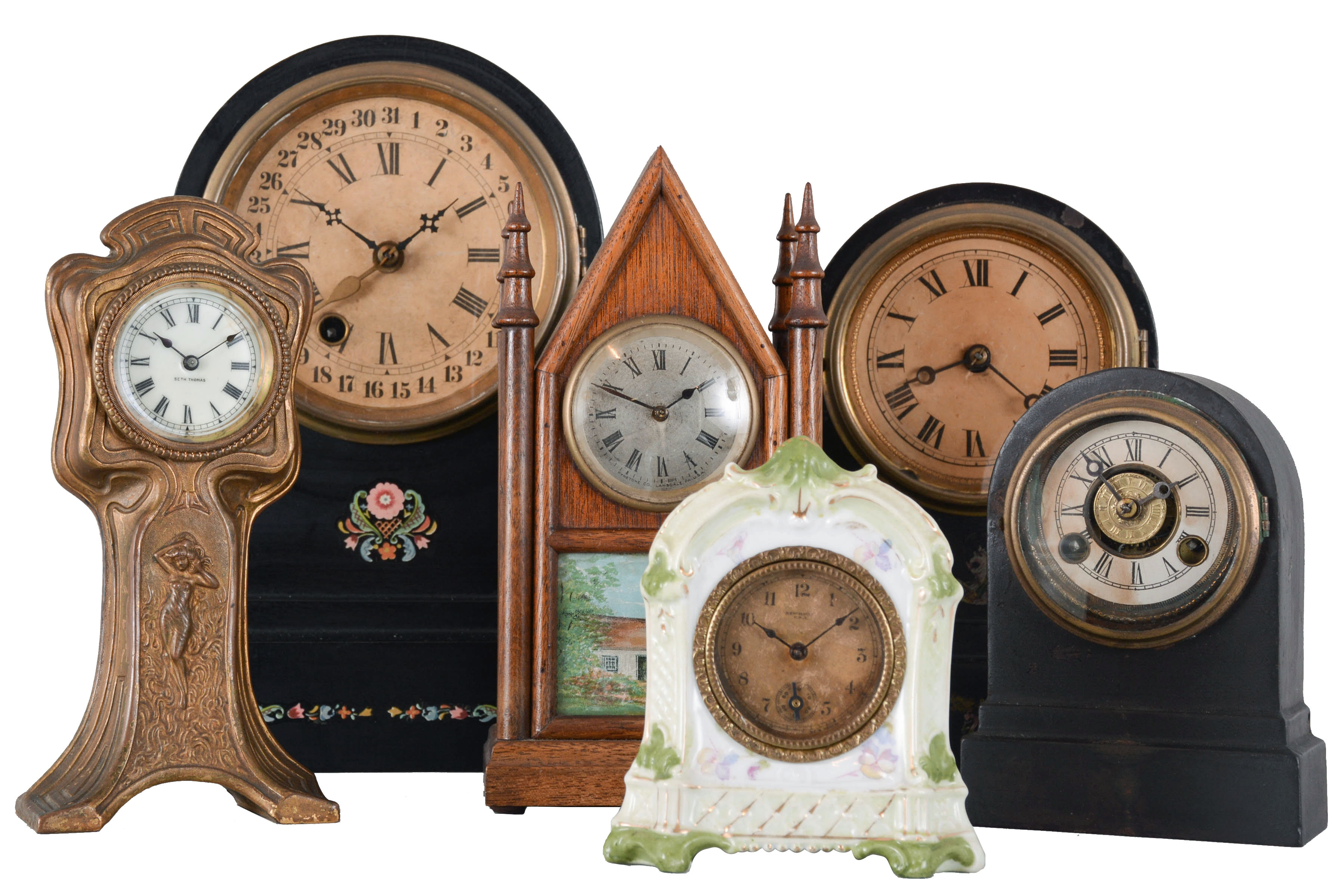 Clocks- 6 (Six) Shelf &amp; Novelty: an assortment of small clocks including a Seth Thomas Art Nouveau novelty clock, miniature porcelain clock by New Haven, miniature steeple by Fynetone Co.,three round top iron case clocks in different sizes by The Terry Clock Company. — Antique Clocks Price Guide