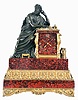 Cailly Freres, Paris, a bronze and griotte marble figural mantel clock, the stepped marble case with gilt, classical ornament, and surmounted by a patinated, seated male figure with robe and laurel crown, in a contemplative pose, the clock dial also of red marble and with applied, gilt Roman numerals and arrow form hands, signed, 8 day, time and strike pendule de Paris movement, originally with silk thread suspension