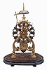 England, late 19th Century, passing strike skeleton clock, in a fretted brass scroll frame, no dome.
