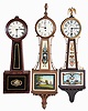 Clocks- 3 (Three): (1) Massachusetts, 8 day, weight brass movement patent or banjo timepiece. This timepiece may have been made by Horace Tifft, North Attleboro based on the bottom door latch, c1840; (2) Waltham Watch Co., Waltham, Mass., 8 day, weight brass lever movement patent or banjo timepiece, c1930 (3) Seth Thomas Clock Co., Thomaston, Conn., "Banjo No. 1", 8 day, spring brass movement patent or banjo timepiece, c1924.