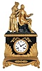 France, a gilt and patinated bronze figural mantel clock, the case in red patina, and with gilt, foliate ornament, the top with green patinated rustic landscape and gilt figures, the male figure seated on a stump, and with sketch pad or canvas, the female standing at his shoulder and admiring the work, Roman numeral white dial signed "Planchon a Paris", blued steel hands, 8 day pendule de Paris movement with silk thread suspension, signed "Pons"