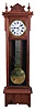 Waterbury Clock Co., Waterbury, Conn., "Regulator No. 60 or 61", jeweler's regulator floor standing clock, 8 day, time only, brass weight driven movement with Graham deadbeat escapement, gridiron lyre pendulum and sweep seconds in an walnut case with a, white enamel dial