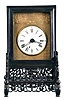 China, bracket clock reproduction, 8 day, time and strike, double fusee, crown verge with center seconds in a rosewood case on fretwork base, white porcelain dial on patterned brass front plate, 20th century.