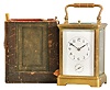 France, striking carriage clock with hour repeat, Corniche case with beveled glass panels, Arabic numeral white enamel dial, blued steel distaff hands, 8 day time, strike and alarm movement with lever platform and cut bimetallic balance, repeating the last hour on demand, with partial travel case