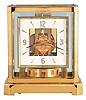 Jaeger- LeCoultre, Switzerland, "Atmos" clock, 15 jewel, caliber 528-8 movement, torsion pendulum, square white painted dial with applied gilt Arabic numerals and arrow markers, gilt hands, all contained in a glazed rectangular case with dedication plaque, serial #256226, c1968.