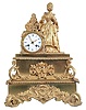 Vincenti & Cie, Paris, figural mantel clock, 8 day, time and strike, spring driven, pendule de Paris with a silk thread suspension in a gilt metal rococo case featuring a young woman beside her dressing table on which are assorted items, white enamel dial with blue Roman numerals and ornate hands.